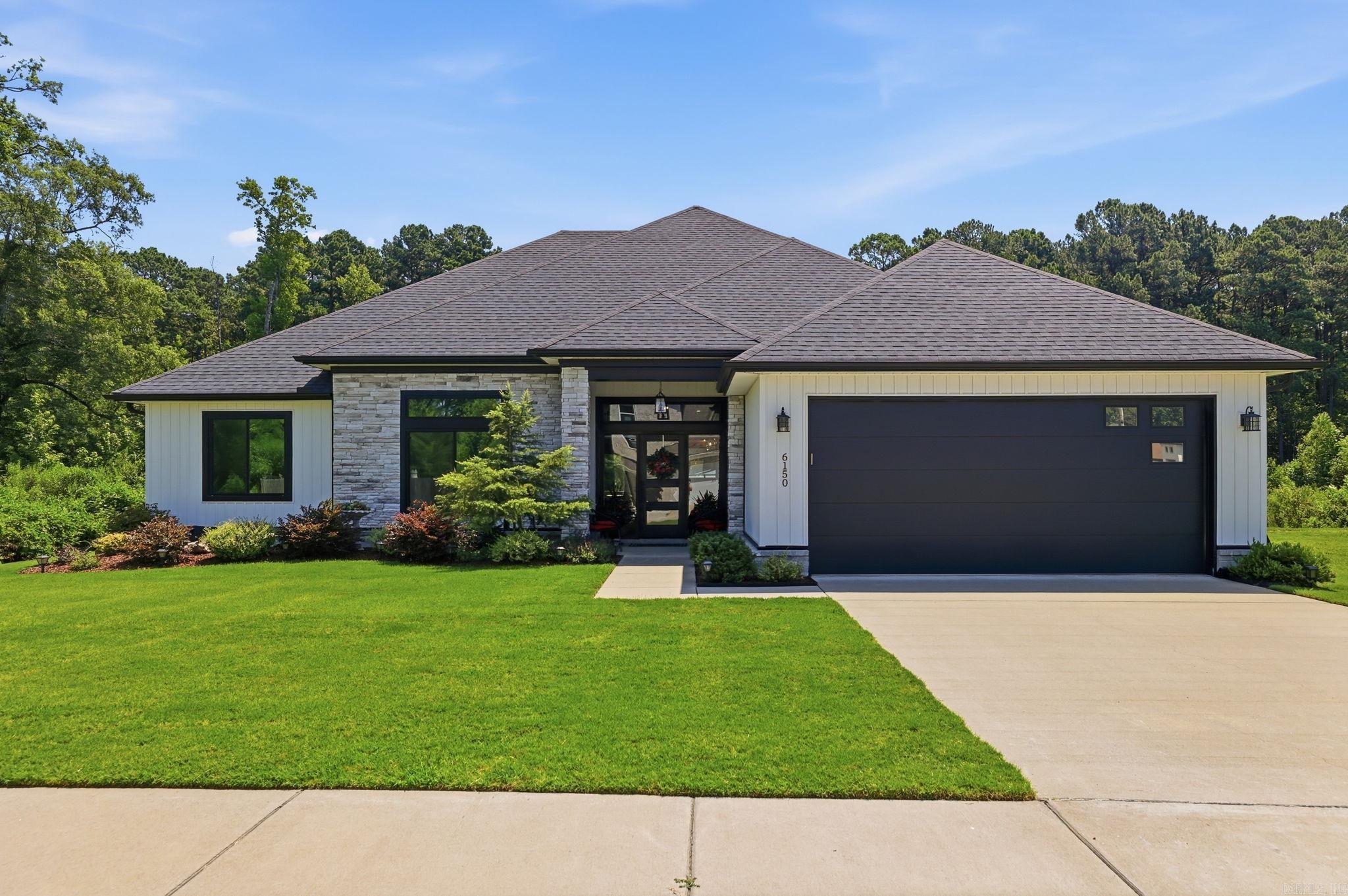 Welcome to this beautifully built 2022 home in the Creekside Subdivision! Offering 2,324 sq ft of living space, 4 bedrooms, and 2.5 bathrooms on a private cleared lot. The primary suite features modern finishes, a walk-in closet with built-in dresser and tons of storage. The open-concept kitchen features beautiful black countertops, large breakfast bar, and gas range, flowing seamlessly into the living room with a contemporary led fireplace. Outside, escape to your private oasis featuring an beautiful landscaping, covered patio, storage building, and all the privacy you could want in a neighborhood. Additional highlights include a 2-car garage, large lot and noe is wired for a whole home generator. Conveniently located in Alexander (just off HWY 5 in Bryant) with easy access to I-30, local shopping, and dining. This like-new home is completely move-in ready—schedule your showing today!