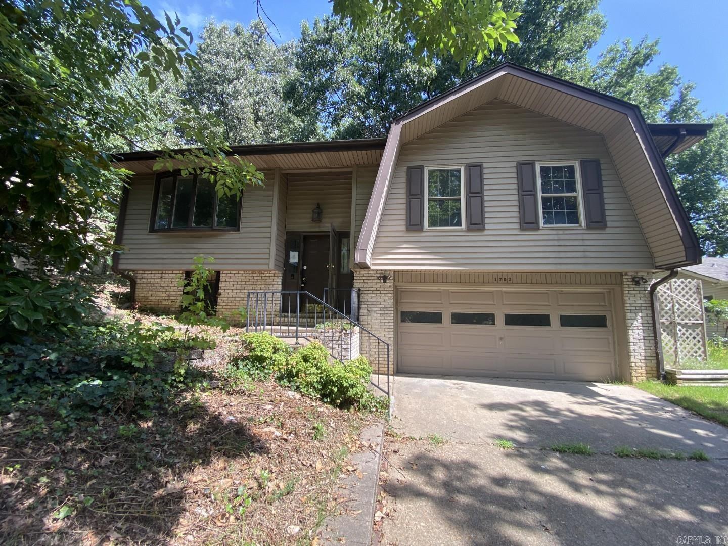 Here's your opportunity to remodel in Jonesboro! This home has 3 bedrooms, 2 baths on upper level. Additionally the lower level contains the garage, laundry room and extra living area, about 481 sq ft. The following Flood Zone information has been obtained for the property, Flood Zone Designation: X. Systems are not guaranteed to work. Earnest Money is required. Agents see additional remarks. Will not work for VA or FHA.