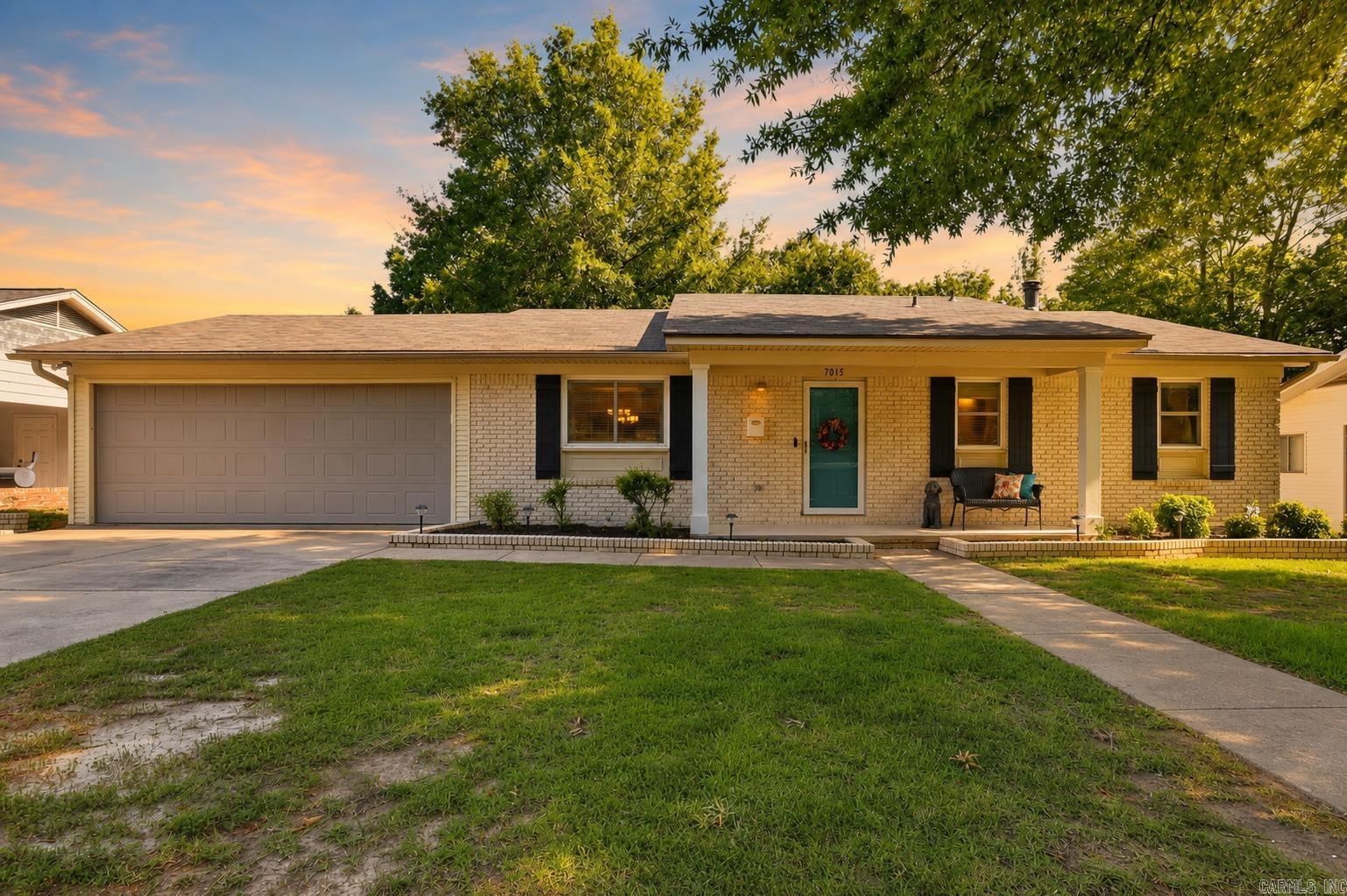 Midtown Little Rock charm with the updates that make moving in easy. This inviting home offers the character you expect in an established Midtown neighborhood, including beautiful original hardwood floors upstairs, while major system updates help take the stress out of homeownership. Updates within the last 10 years include fresh interior paint, new lighting, windows, HVAC, ductwork, hot water heater and more, plus a roof replaced in 2022. The HVAC system also includes UV lighting, and the crawlspace has been fully encapsulated. The primary bathroom has been completely gutted and renovated for a fresh, functional feel. Outdoor living is a standout, with a deck off the kitchen, perfect for grilling, dining and entertaining. Downstairs, a second covered outdoor area is accessed from the family room through sliding doors. The oversized laundry room offers built-in storage, and a separate utility room with a sink and backyard access is ideal for storage, plants, potting or hobbies. The carport has also been converted into a garage. An office that was once a bedroom could easily be converted back if needed. Fantastic Midtown location, practical updates and truly move-in ready appeal.