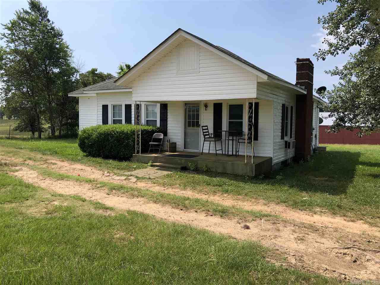 535 acres of pasture land in the city limits of Glenwood. There are 3 houses on the property. Two are rentals producing monthly income and the other is home to the current owner. City and county water is available as well as city and county trash pick up. There are 7 ponds and 1 mile of rock creek running through the property. Multiple barns and shops for storage. One minute drive to Centerpoint Schools.