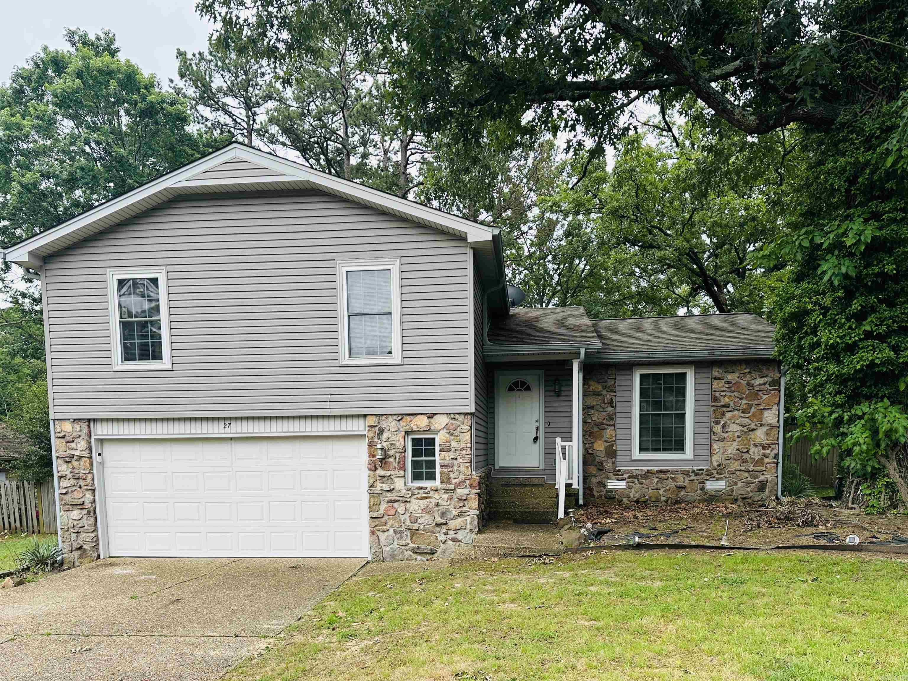 Great opportunity on this split-level home for the investor, fixer upper or first time home buyer.  The home is in a nice neighborhood convenient to shopping, restaurants and Lake Wilastein. There are four bedrooms, two and a half baths and a two car garage with extra storage space.  Great room has a fireplace.  Newer updates include newer roof (5 years or less) 2023 AC, new garage door, siding and windows.  There is a formal dining or living room in front of house, and kitchen has an eat in area as well.  Large Fenced backyard with a storage shed. Gutters. Home is being sold in "as is" condition.  Agents SEE REMARKS.