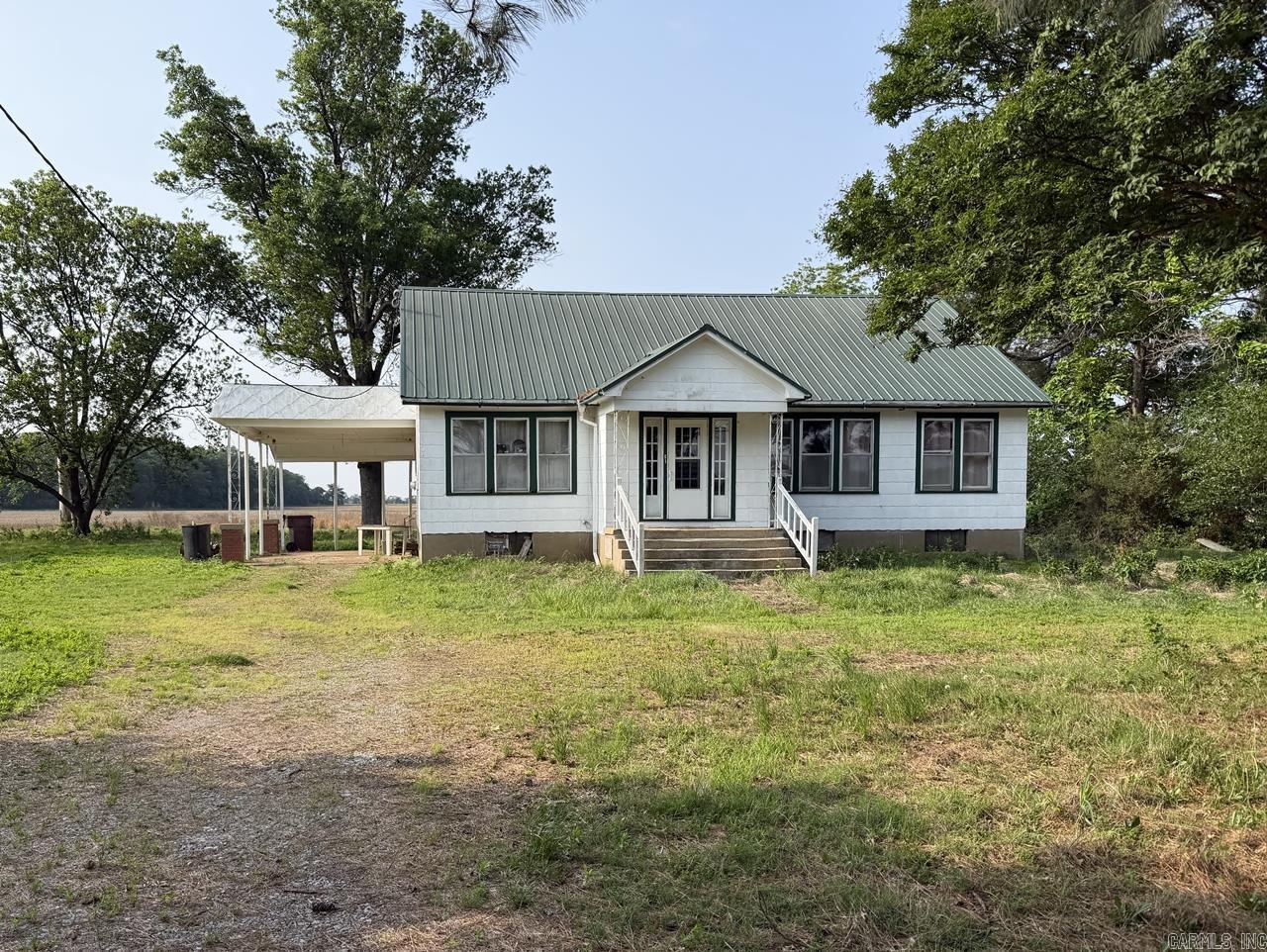 This 4-bedroom, 1-bath cottage would make a great hunting lodge or a country homesite!  Wood floors, updated bath, and newer kitchen flooring and backsplash.  To be sold As Is.  Call today for a tour of this country home!