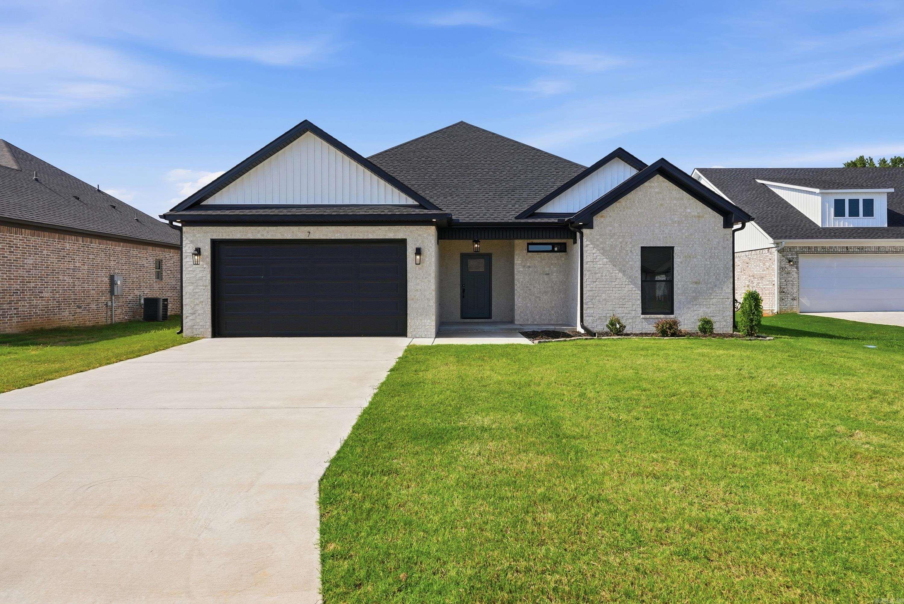 Discover the perfect blend of style and functionality in this beautiful new construction home located in the East Meadow subdivision of Greenbrier. Offering 1,884 heated and cooled square feet, this 3-bedroom, 2-bath home features an inviting open floor plan with luxury vinyl plank flooring throughout and quality finishes at every turn. The spacious kitchen is designed for both everyday living and entertaining, showcasing custom cabinetry, solid surface countertops, stainless steel appliances, a large island, and a generous pantry. The split-bedroom layout provides privacy, with the primary suite situated away from the secondary bedrooms and featuring a double vanity, oversized tile shower, and large walk-in closet. Outside, you'll find a low-maintenance brick exterior, attached 2-car garage, covered back porch, and a .21-acre lot. Located in the highly desirable Greenbrier School District, this move-in-ready home includes a 1-year builder warranty for added peace of mind. Experience the quality and convenience of new construction in one of Greenbrier's growing neighborhoods.