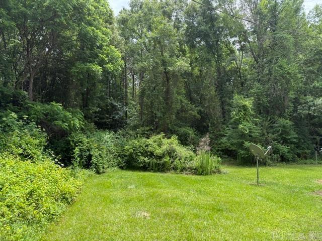 Discover the perfect blend of peace, privacy, and natural beauty on this 5.4-acre property. This beautiful tract offers plenty of space to build your dream home. The property will come with utilities available, making it easier to begin your plans. Mobile home to be removed.