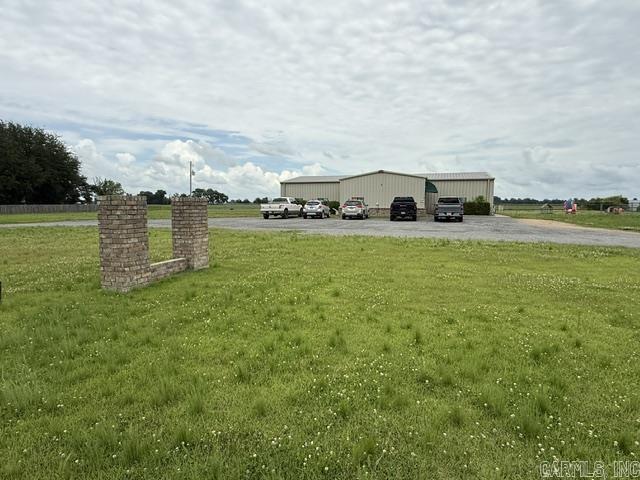 Great investment property with an active lease producing good monthly income to the owner. The lessee has a good paying history with the present owner. Nice location just outside the city limits. Very nice commercial building with plenty of room for expansion if needed. Nice children playground with a chain link fence. Give us a call to walk through the building during business hours.