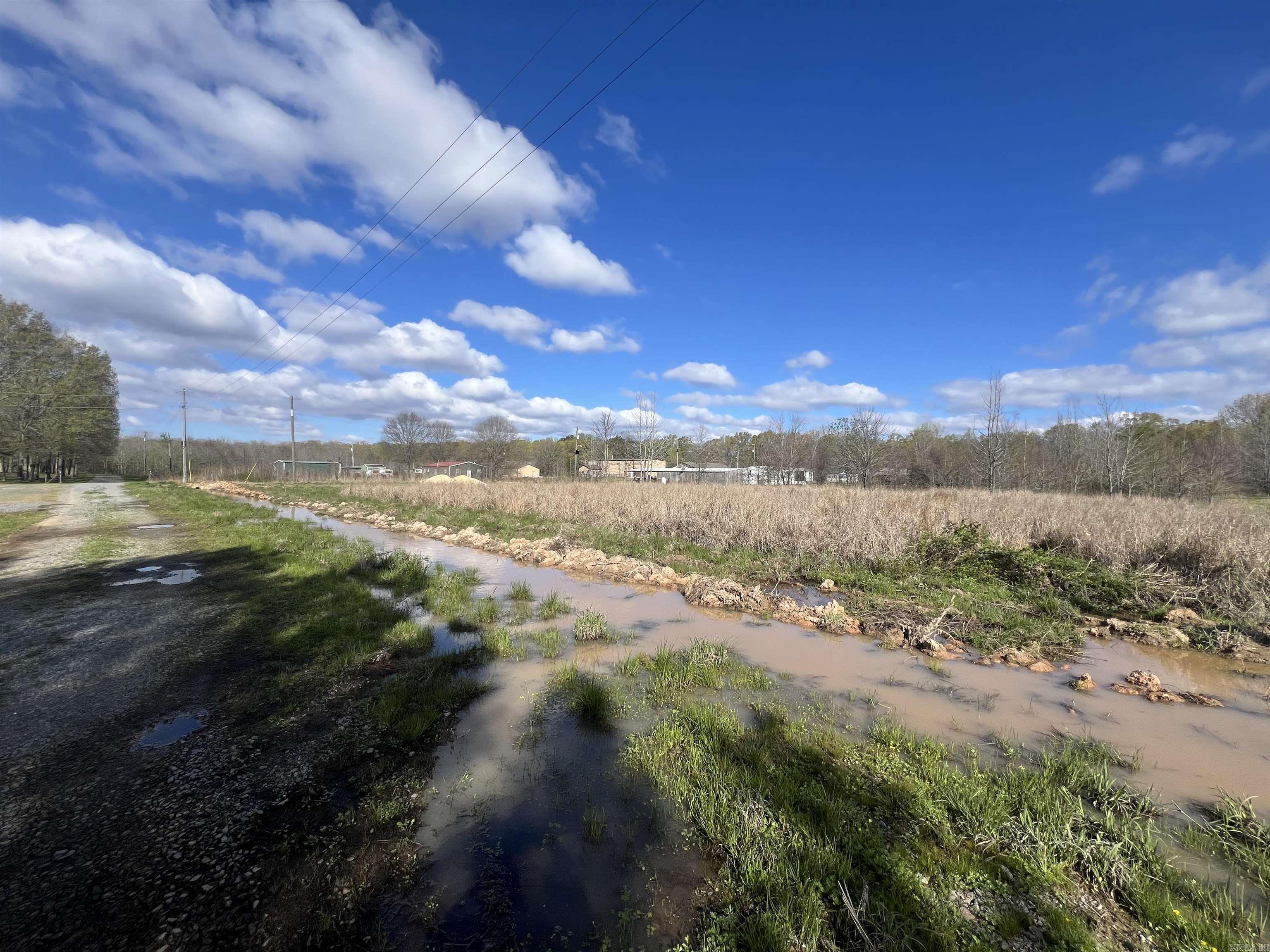 Discover the perfect spot for your next Outdoor retreat with this 1± acre lot located on Drake Lane in Stuttgart, Arkansas. This property is already equipped with water, electricity, and septic making it ready for you to start building your ideal hunting camp right away.  Conveniently situated just 4 miles from the Lower Vallier Ramp at Bayou Meto, you’ll have quick access to some of the finest green timber duck hunting and whitetail hunting in the state. Outdoor enthusiasts will also appreciate being only 3 miles from Hallowell Reservoir, offering additional opportunities for fishing and recreation.  The property is just 20 minutes from DeWitt and near the Dale Bumpers White River National Wildlife Refuge, a renowned destination known for exceptional hunting and fishing.  If you're looking to build a private getaway, this property offers an unbeatable location with utilities already in place.