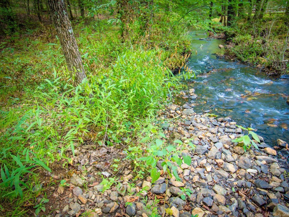 Beautiful 5 acre lot inside of the Waldenwood Subdivision. This gated community is just minutes from Costco and Kroger, but still outside of city limits and offers quiet country living!  There is a gravel road started that leads to what would be the best build site.  There is also a creek on the property.  Come see it today!
