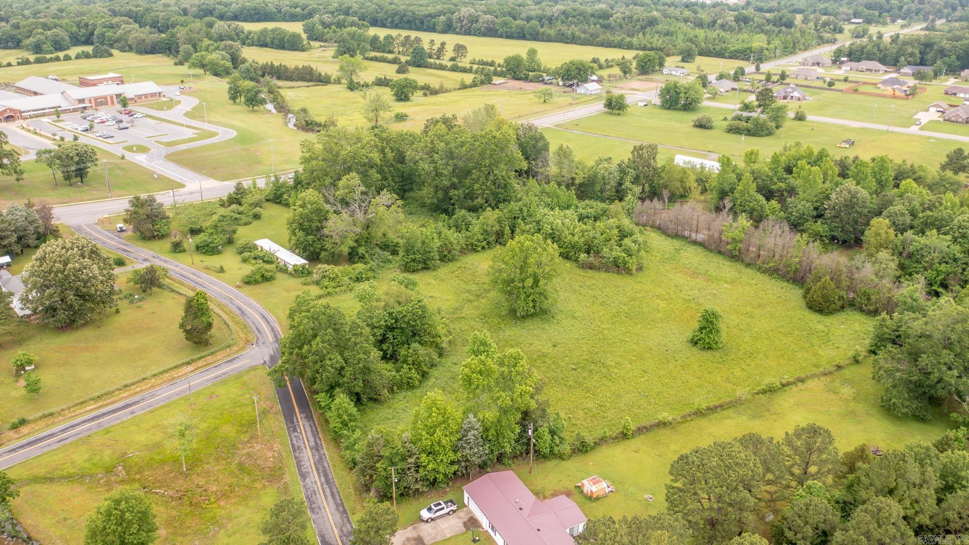 Perfect spot to build your dream home or invest in your future! Plenty of space and great accessibility. 5.54 Acres Corner Lot Road Frontage Utilities available at the road No current restrictions Potential for commercial use Great for multifamily development Seller would consider subdividing,