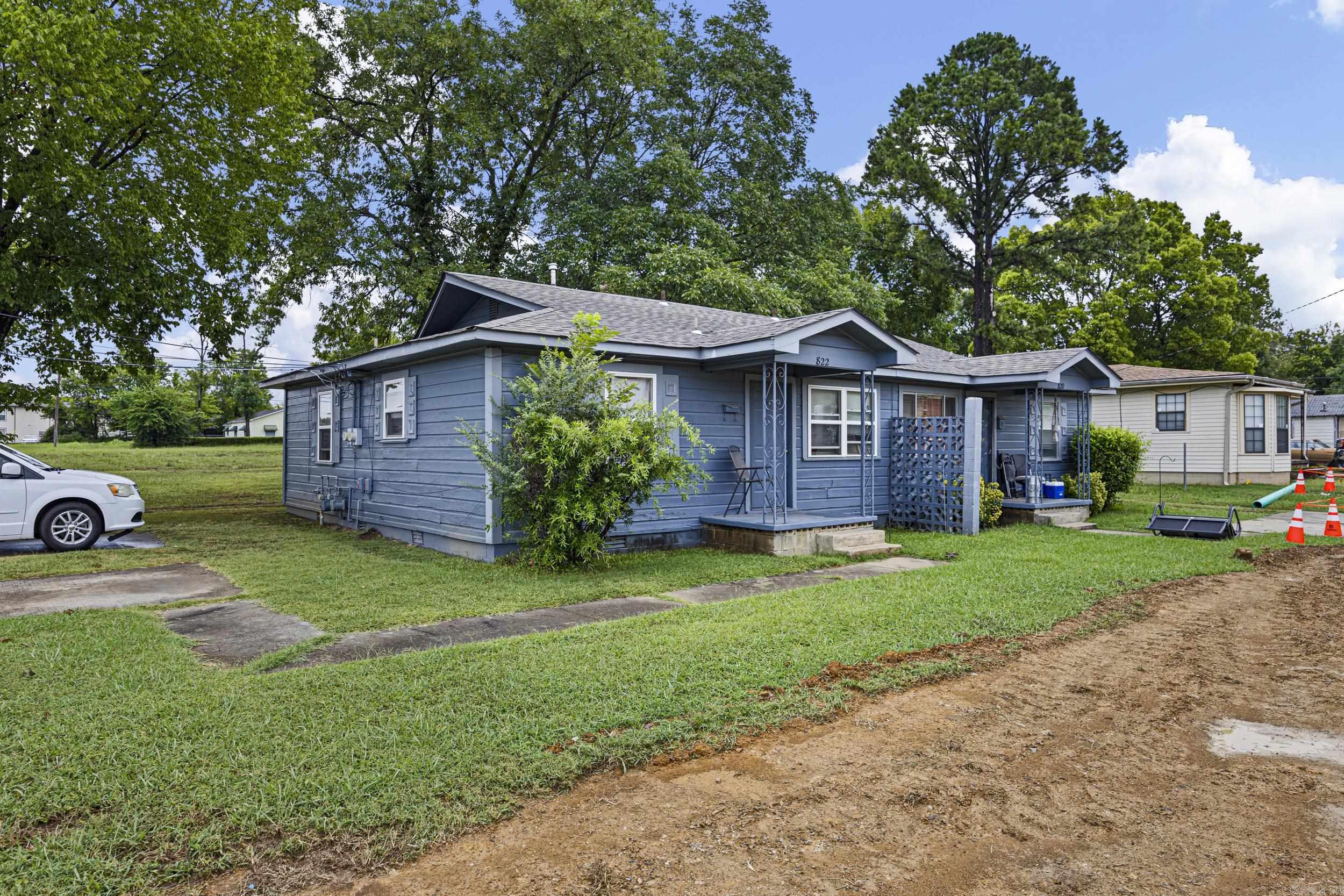 Investment opportunity near Hendrix College and downtown Conway! Situated on a corner lot, this duplex sits on 0.23 acres & includes two approximately 832-square-foot units, each with 2 bedrooms and 1 bathroom. Both units are currently occupied, and could use some TLC.   The property offers a solid opportunity to add value for an investor looking to improve the units, strengthen future rental income, and build equity over time. The roof was replaced in 2023, providing a meaningful improvement. With its convenient location near downtown, shopping, dining, and other local amenities, this duplex has the potential to become a stronger-performing rental property with the right updates and management.