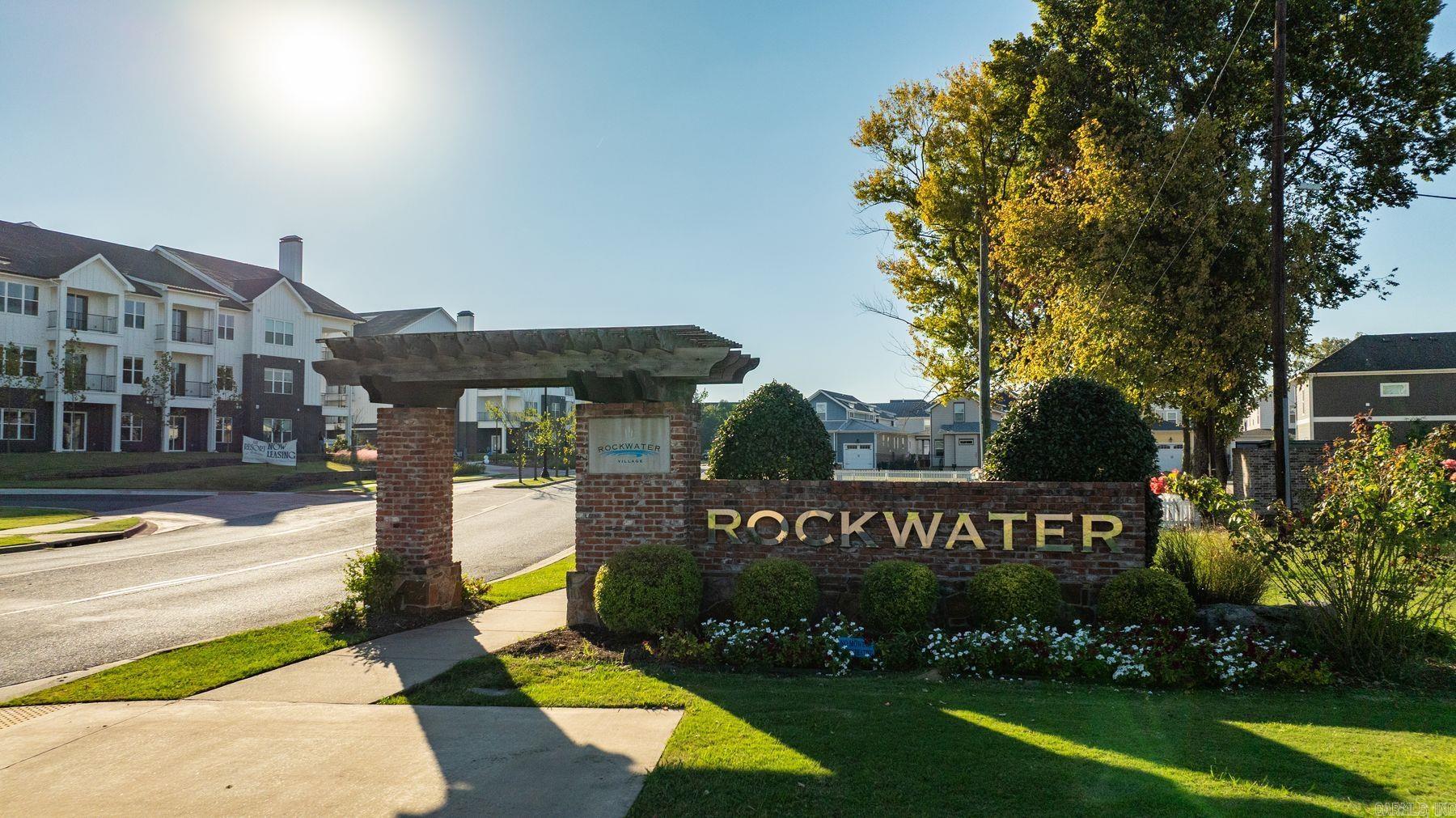 Located in the desirable Rockwater Village community in North Little Rock, this homesite offers an exceptional setting to build a custom home just minutes from Argenta's thriving growth and downtown Little Rock. Residents of Rockwater have access to a full-service marina along the Arkansas River, adding a unique element to the lifestyle here that’s hard to find elsewhere in Central Arkansas. Situated within The Residences at Rockwater, a gated neighborhood known for its classic Southern architecture and thoughtfully designed streetscapes, this lot provides both charm and convenience in one of Central Arkansas’s most sought-after areas.  Residents enjoy close access to the Arkansas River Trail, along with quick connections to restaurants, entertainment, and cultural attractions. Rockwater Village continues to attract homeowners seeking scenic surroundings, a strong sense of community, and an ideal location near the Arkansas River corridor. This homesite offers the chance to build in a well-established neighborhood that blends natural beauty, architectural character, and easy access to everything the North Little Rock and Little Rock area has to offer.   See agent remarks!