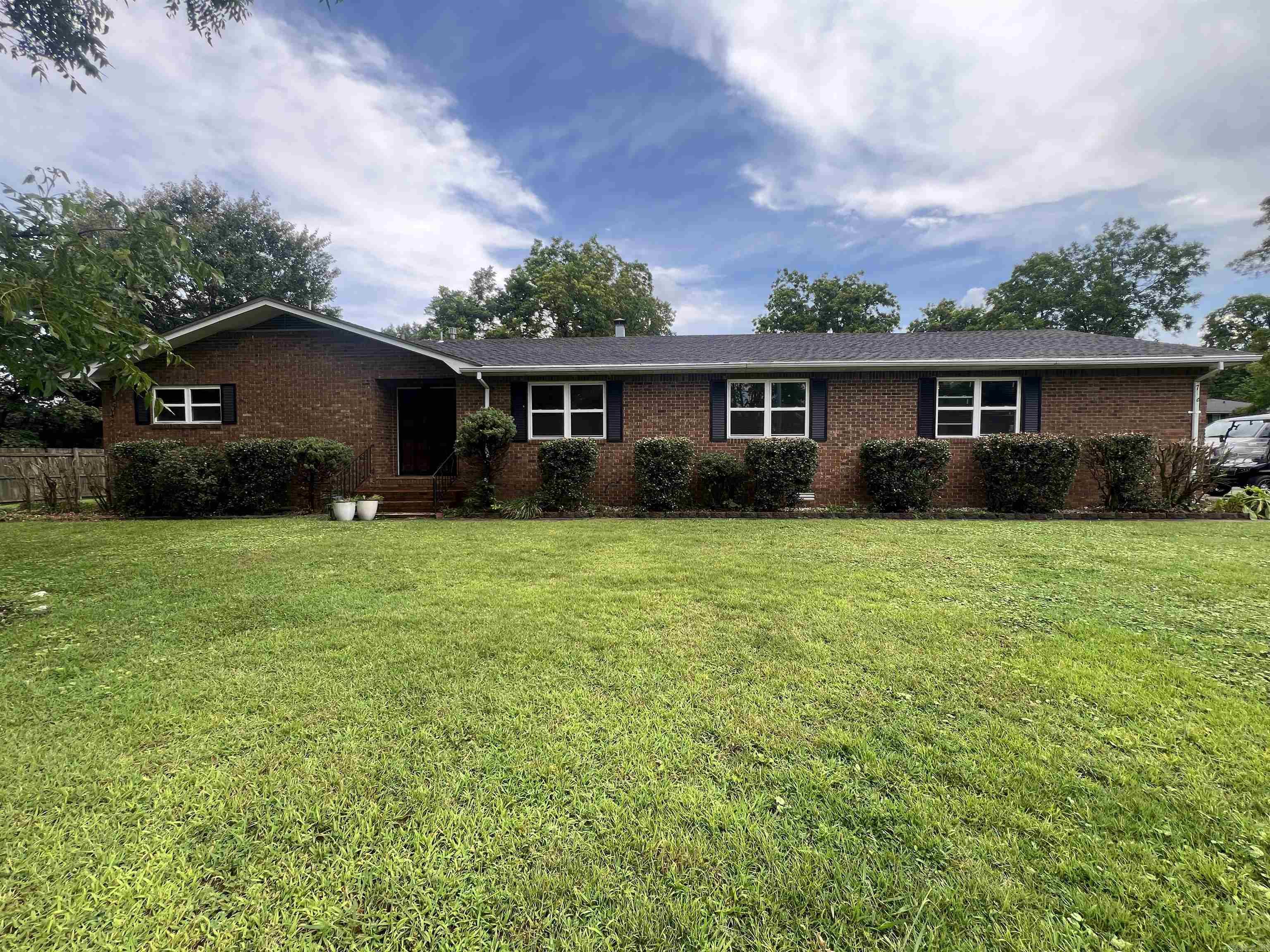 Move right into this beautifully updated 3 bedroom, 2.5 bathroom home offering 1,776 square feet of comfortable living space on a .25-acre lot. With an additional living area, there's plenty of room for a growing family, a home office, playroom, or entertainment space.  Step outside to enjoy the private covered back porch and large shop, providing extra storage and space for hobbies. Major updates have already been completed, giving you peace of mind for years to come, including a new roof, new HVAC system, new water heater, new low-E windows, and new bathroom flooring. Don't miss your opportunity to make this home yours!