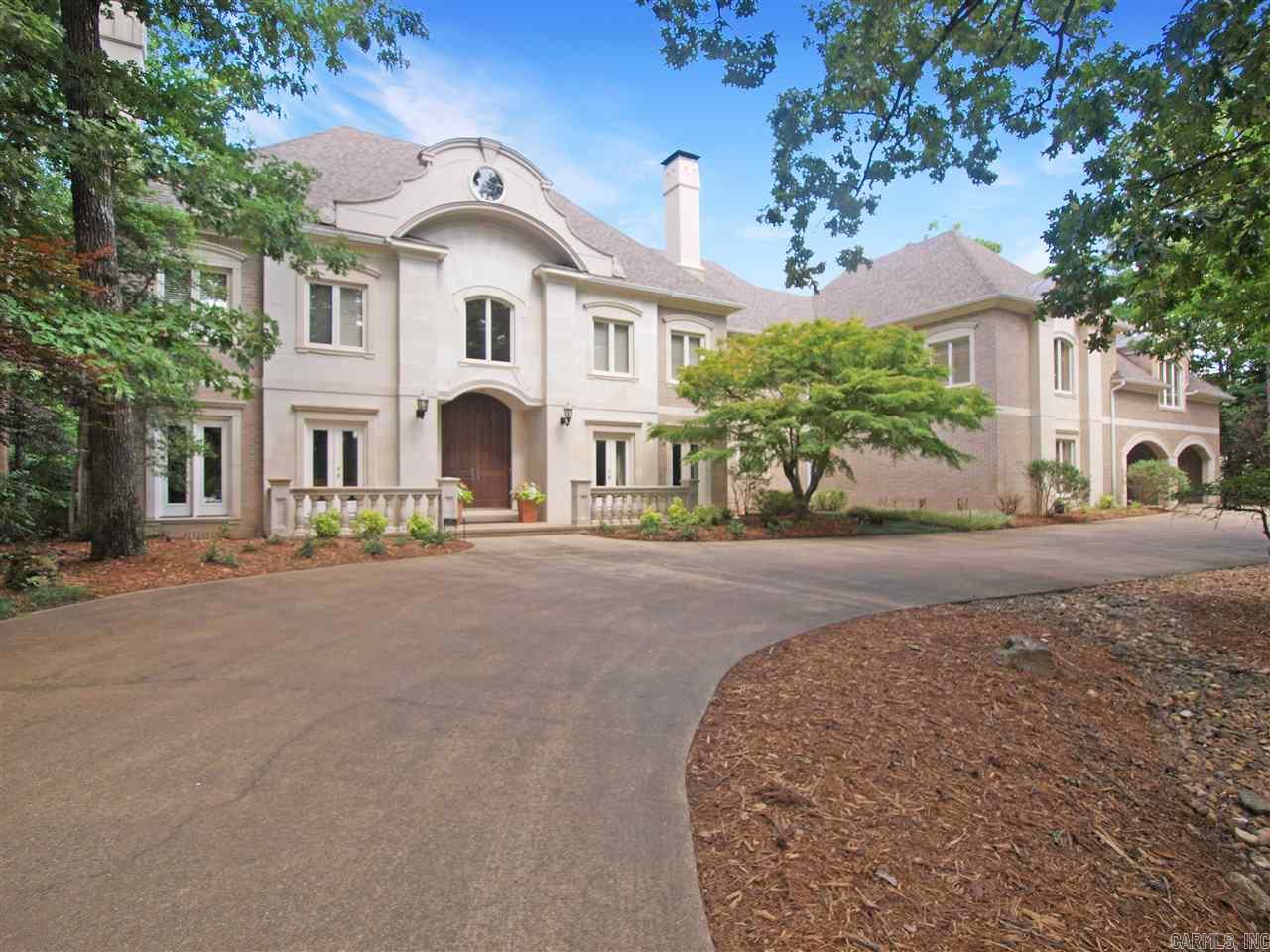 Exceptional custom limestone & brick home nestled on 5 wooded acres. Elegant Formal areas, Cozy Study w/FP & bookcases, Master Suite on main level features FP, dbl vanities, jetted tub, 2 Walk-in closets.  Chef's Kit w/lg Island, Viking 6 burner gas range, Subzero, wet bar w/ice maker, lg pantry & is open to Family Rm w/fp & Bkft Rm.  Upstairs are 4 BR with 3 BR on suite Bathrm w/walk-in closets. Lg Gameroom, Lg Bonus Rm! 5 Car Garage, Covered patio overlooks private gunite pool. Walk-out Storage! Come See
