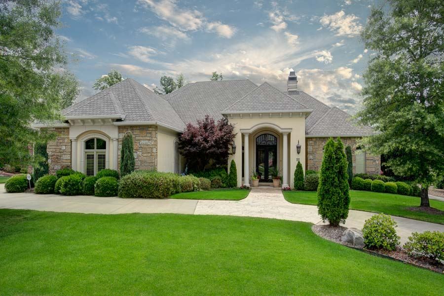 Stunning Joe Hughes custom home (build as his own personal residence) in the gated Deauville.This one level home pairs classical elegance with modern inspiration – meticulous craftsmanship, flowing spaces, soaring ceilings & abundant views of the lush landscaping. Family comfort meets gracious indoor and outdoor entertaining with an open airy chef’s kitchen, formal and informal dining, sensational great room, den & study.Luxury master suite with two guest suites. Additional 640 sq ft could be finished out.