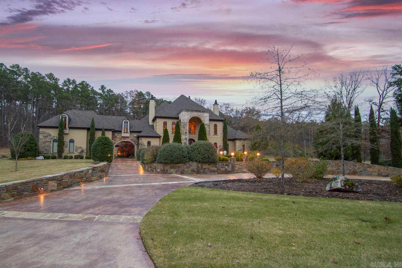 Spectacular West Little Rock home! The Ultimate setting for enjoying the best in family living & entertaining friends. Quality construction and impeccable design located on over 5 acres in gated subdivision. Fabulous gourmet kitchen w/ top of the line appliances. Banquet dining, Stunning family rm w/ soaring ceiling and stone frpl. Luxurious master suite w/ two additional guest suites on the main level. Three addit bedrms up, exceptional media and game rm. 5 car garage, call for extensive list of amenities
