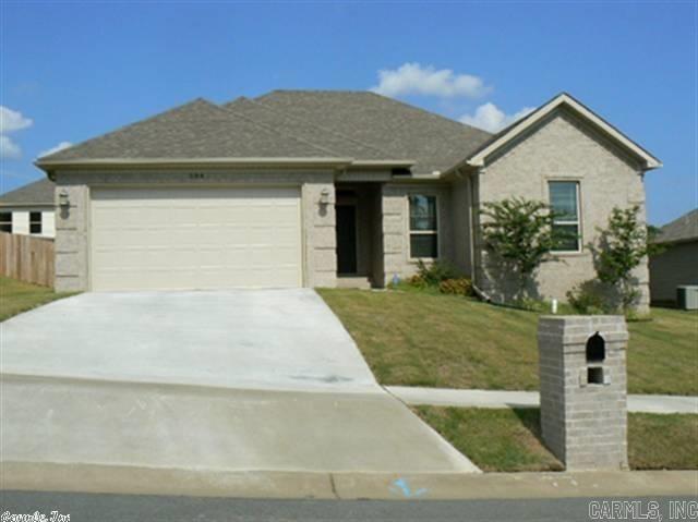 Split bedroom plan.  Hardwood flooring accenting the living area.  Master bathroom features jetted tub. Refrigerator, washer and dryer to remain with no warranties. No pets and no smoking permitted in the home.