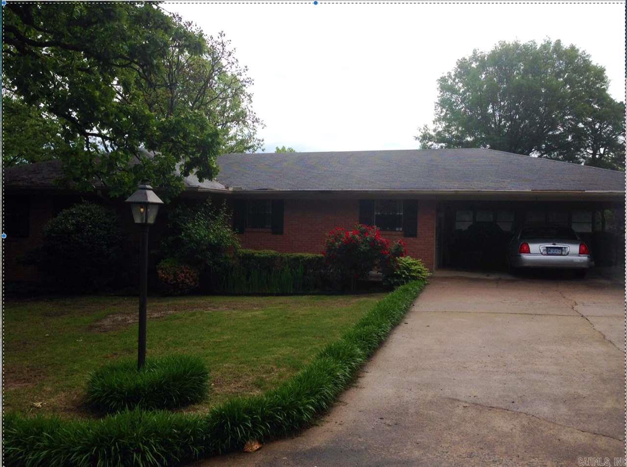 Estate Property being sold "AS IS."  Executors do not know exact sq footage and sq footage quoted is based on county records.   Buyers are encouraged to measure.  Estate Sale is going on Friday, May 10th and Saturday, May 11th.  House needs TLC, but has many enact vintage mid-century features.  Great space buy for the area!