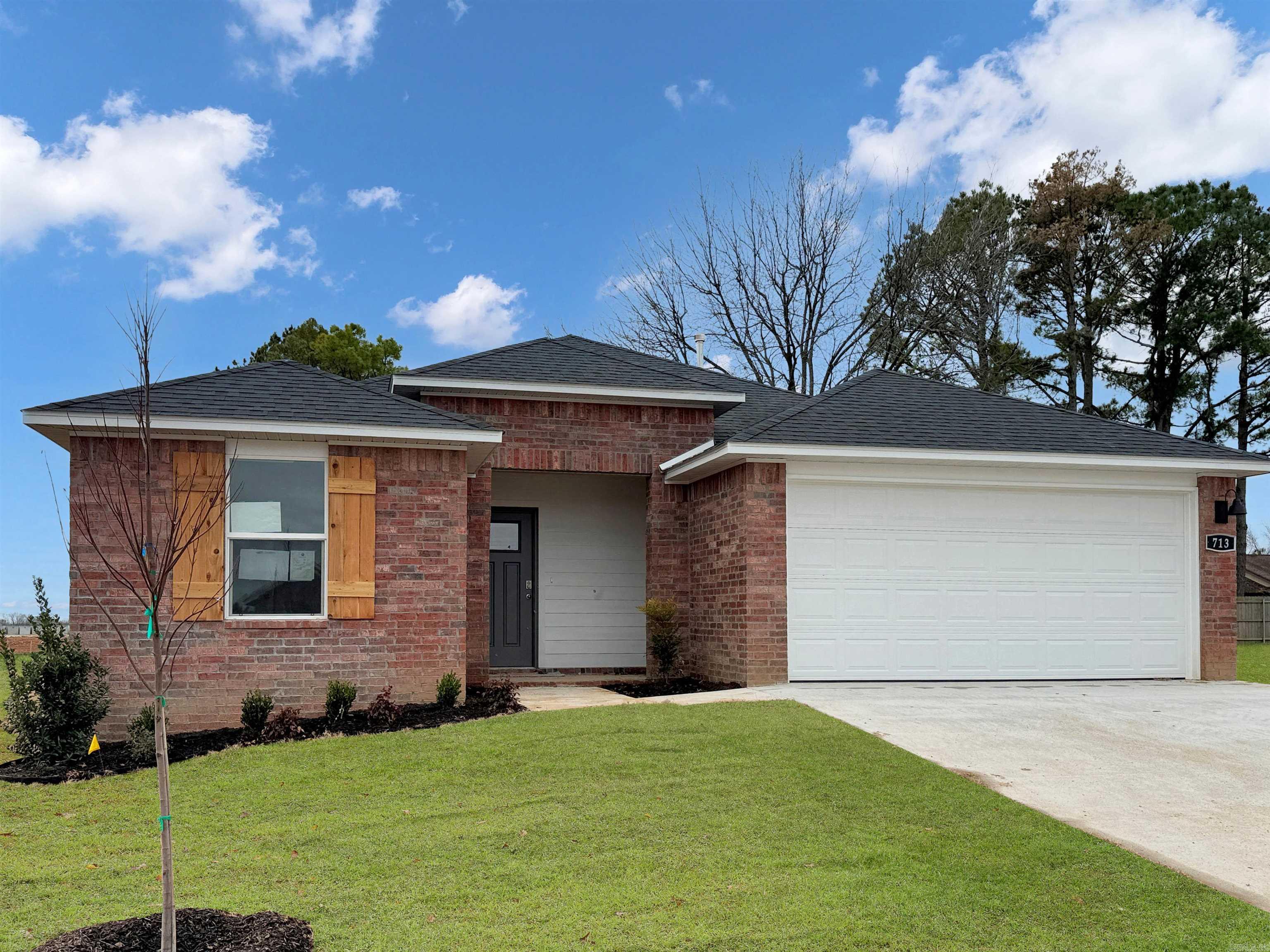 Delightful Denton plan in Cherry Addition, located in Beebe, AR! These homes offer modern amenities and open floorplans for comfortable living. Each home features LVP flooring throughout, quartz countertops in the kitchen and bathrooms, and a ceiling fan in the living room! The primary ensuite offers a walk-in shower, double sinks, and chrome fixtures. Exteriors will feature brick with siding per plan, and a covered patio per plan! Programmable thermostat! HOA, taxes, and individual parcel TBD.