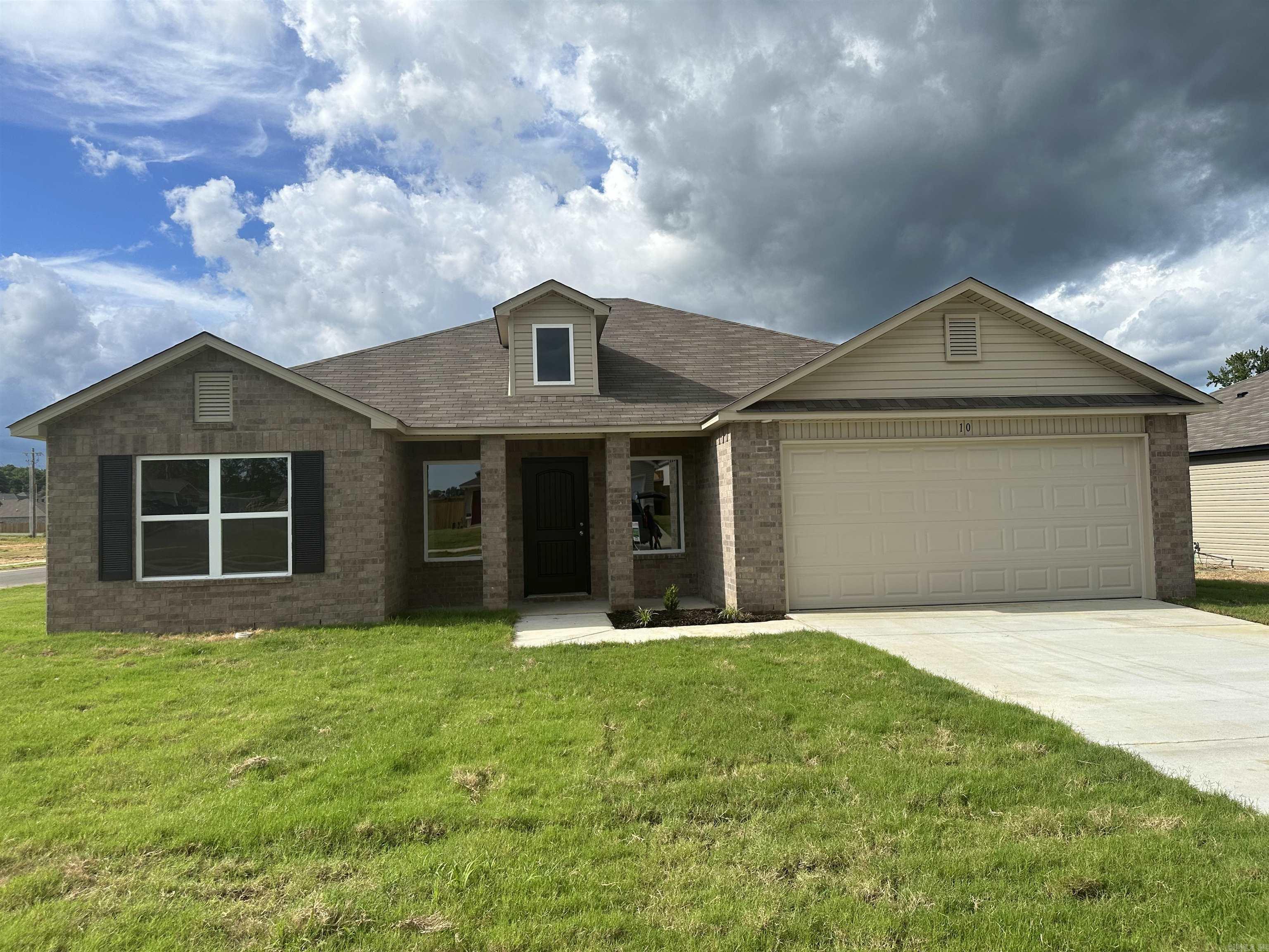 Washington plan corner lot  Upgrades: 14'x10' uncovered patio, 3050 Low E window in Master Bedroom, 60" fiberglass standup shower in Master Bath, plumbing faucet upgrade 2, 8" deep Kitchen sink, 16" laminate bar top in Kitchen, Luxury Vinyl Plank flooring in wet areas and Living Room and adjacent hallways, raised ceilings in Living Areas per municipal requirements, fiberglass exterior doors, Cheyenne style doors, baseboards level 2, double bowl vanity in Master Bath, LED disk lights in Kitchen, full sod, smooth top range, corner lot.    THIS HOME IS SCHEDULED TO BE COMPLETE IN MID MAY.   ***AGENTS: PLEASE SEE AGENT REMARKS AND/OR SHOWING REMARKS.***  PLEASE NOTE: The mailing address for this property is Cabot. The city that governs this neighborhood is Ward. The community is located in the Cabot School District.
