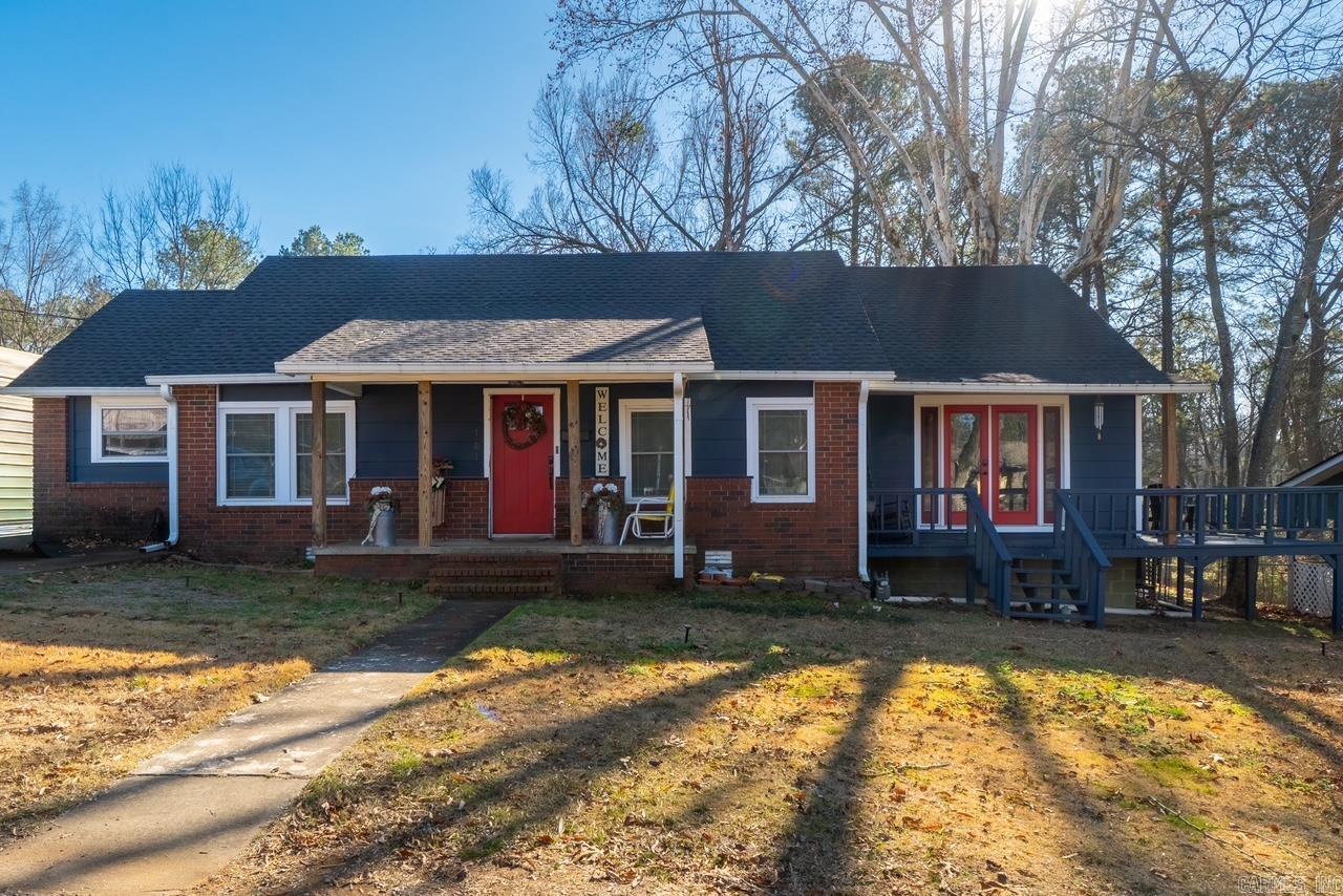 Step into the charm of the 1930s with this beautifully updated 3 bedroom, 2 bathroom home full of character and thoughtful modern upgrades. Located in the heart of Clarksville, this historic home blends timeless details with updated functionality, offering a unique space you truly won’t find anywhere else. Inside, you’ll find original charm throughout, including exposed shiplap accents, along with a spacious layout featuring a loft and additional flex space perfect for a home office, playroom, guest area, or second living space. The completely renovated kitchen features custom soft-close cabinetry, granite countertops, and updated finishes designed for both beauty and function. Both bathrooms were also fully renovated in 2018. Major system updates provide peace of mind, including all new electrical and plumbing in 2018, all new double-hung windows in 2019, new gutters with a lifetime warranty in 2021, and a brand new roof installed in 2025. Outside, enjoy relaxing or entertaining on the covered back patio while taking in the charm of this established neighborhood. This home has been lovingly restored while preserving the warmth and character that make historic homes so special.