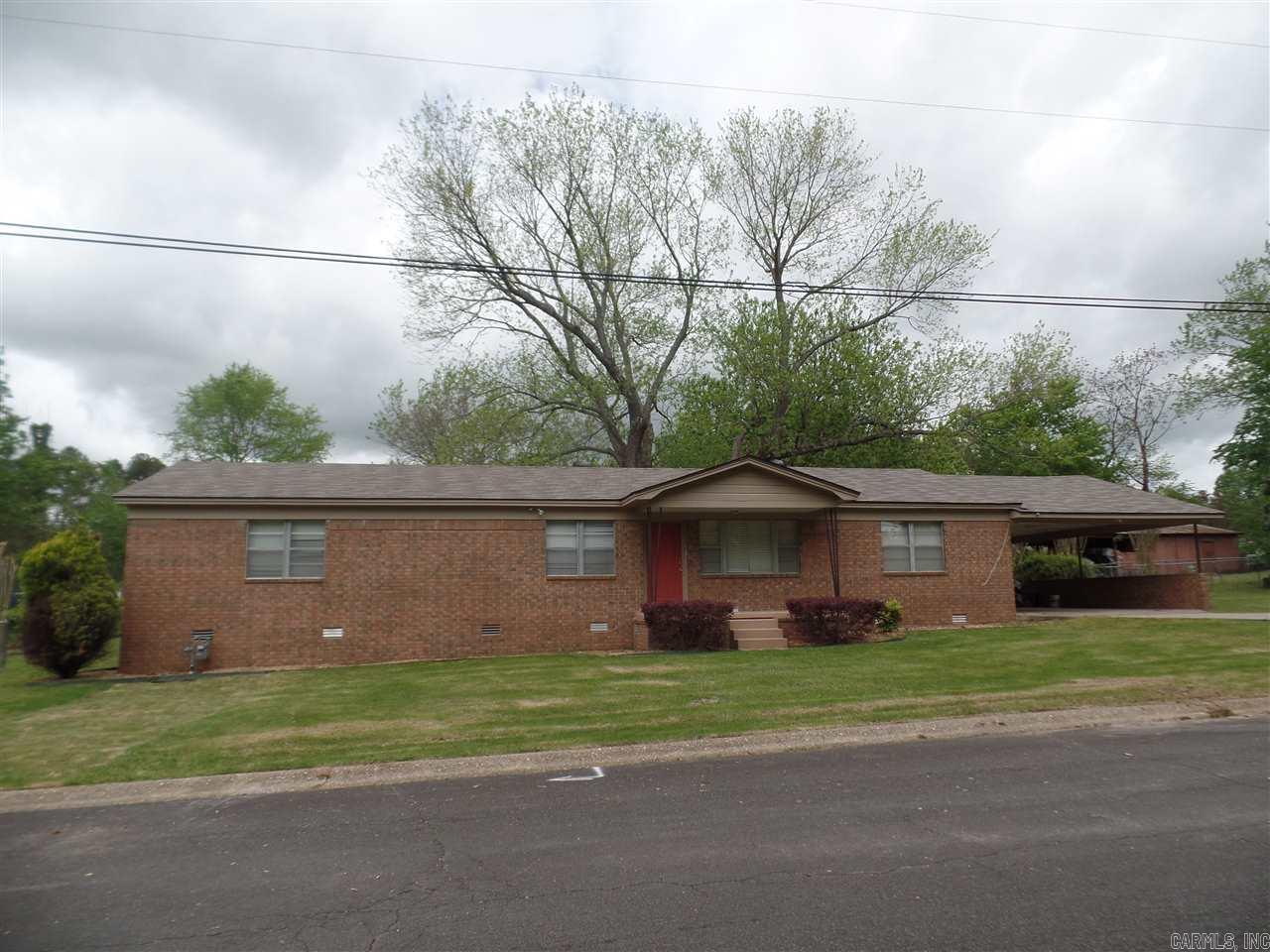 Spacious and Newly Updated 3BR 2BA Brick Home on .75 acres with fenced yard in the heart of Benton convenient to schools, shopping, and hospitals--Updates include new plank flooring, new paint and trim throughout, new lighting, new tile counter tops, Spacious kitchen with pantry, Built ins, 2 inch blinds, walk in closets, New roof, Master Bedroom and Bath, 2 Large family areas, fenced yard with nice covered Pavilion for entertainment, Outside storage building, Updated landscaping