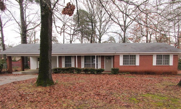 Brick home in good neighborhood.  Make this your new home.  This home has 3 bedrooms and 2 baths with carport, big backyard, outside storage building, back patio.  Awaits your personal touches  Call today for your personal tour!! **Agents See Remarks**