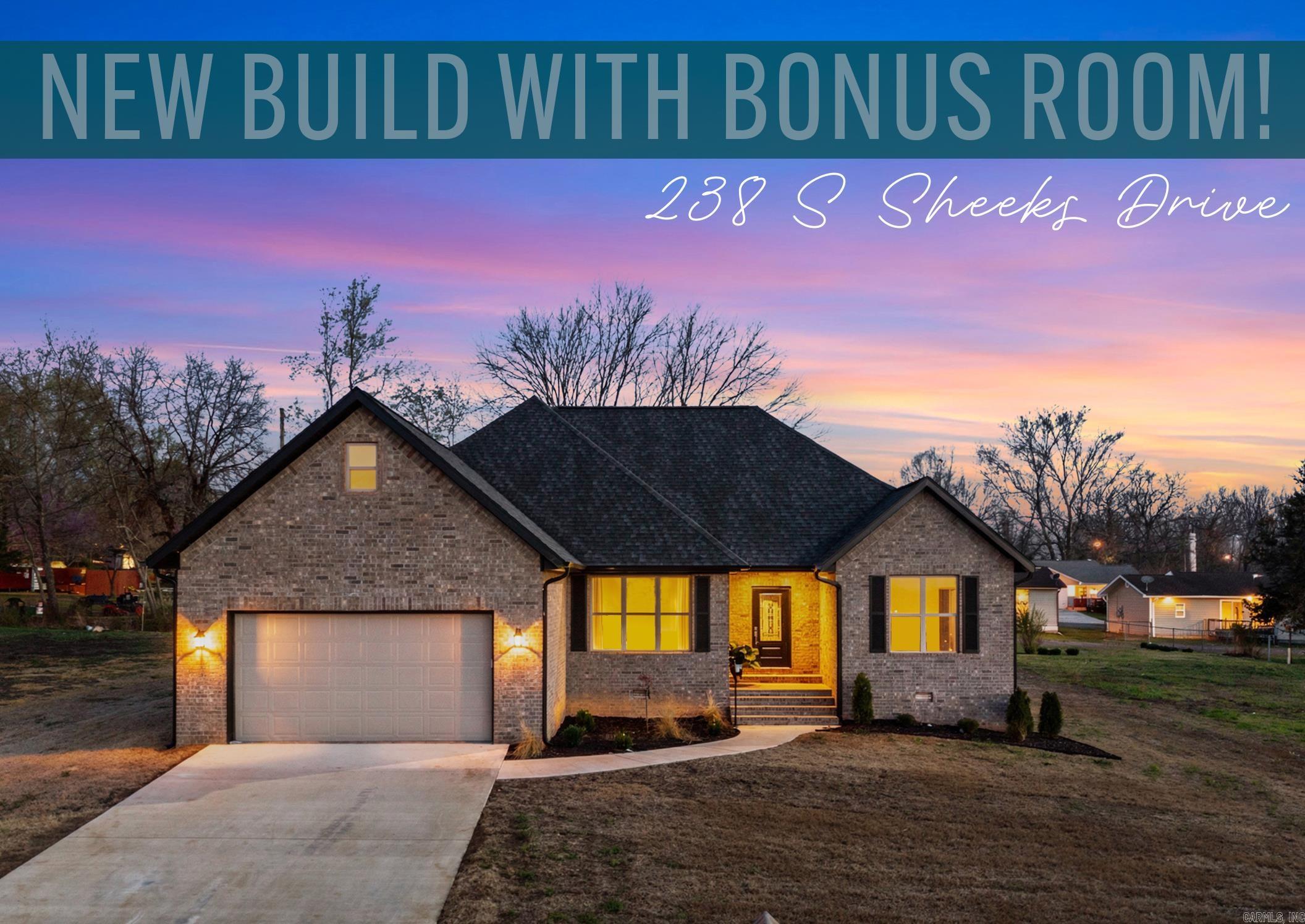 New construction in the desirable Big Creek Estates golf course community. This brick home offers 3 bedrooms, 2 baths, and a versatile heated and cooled bonus flex space above the oversized two-car garage, equipped with a mini-split unit for independent temperature control. The open living area features a gas fireplace and abundant natural light. The kitchen includes gorgeous stone countertops, ample cabinetry, and a bright breakfast area, with a separate formal dining room overlooking the course. The split-bedroom floor plan provides privacy, with a spacious primary suite featuring double vanities, a soaking tub, walk-in shower, and large walk-in closet. Enjoy entertaining outdoors on the covered back patio. Additional highlights include architectural shingles, exceptional storage throughout the home, and an extended garage bay with a separate storage/mechanical room.
