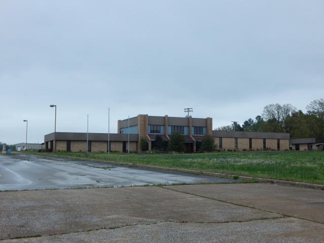 25 Prime Visible Acres located on Hwy 167 include 9 buildings for total SF of 51,040. Around 10 - 11 acres of open space for additional use. Previously used as trucking company, buildings would be great for any large equipment business.