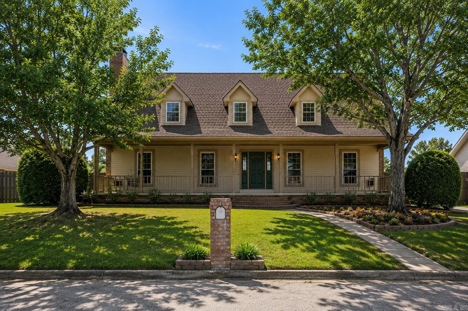 Immaculately kept and move-in ready! This spacious 3 bed, 2.5 bath home offers 3,202 sqft with THREE bonus rooms and endless flexibility. Downstairs bonus room features built-in hooks and storage, perfect for a mudroom, craft room, or office. Upstairs bonus areas could serve as a second den, game room, dedicated 4th bedroom, or guest suite with private side entry and deck access. New roof in 2024, tankless water heater, wired for fiber internet, Ring security system, and separate laundry room. Oversized insulated side-loading 3 car garage includes utility sink and abundant storage. Huge covered front porch with porch swing, fresh mulch and landscaping, sprinkler system front and back on separate meter, plus large fenced backyard with new double gate and multi-level deck. Interior features include granite countertops, bay window in kitchen, large brick fireplace with custom built-ins, wood beam ceiling accents, intercom system, beautiful wood details throughout, and many large new double-paned windows. Spacious primary suite offers his and her closets and vanities. New appliances, fresh paint, and freshly cleaned carpets complete this exceptional home!