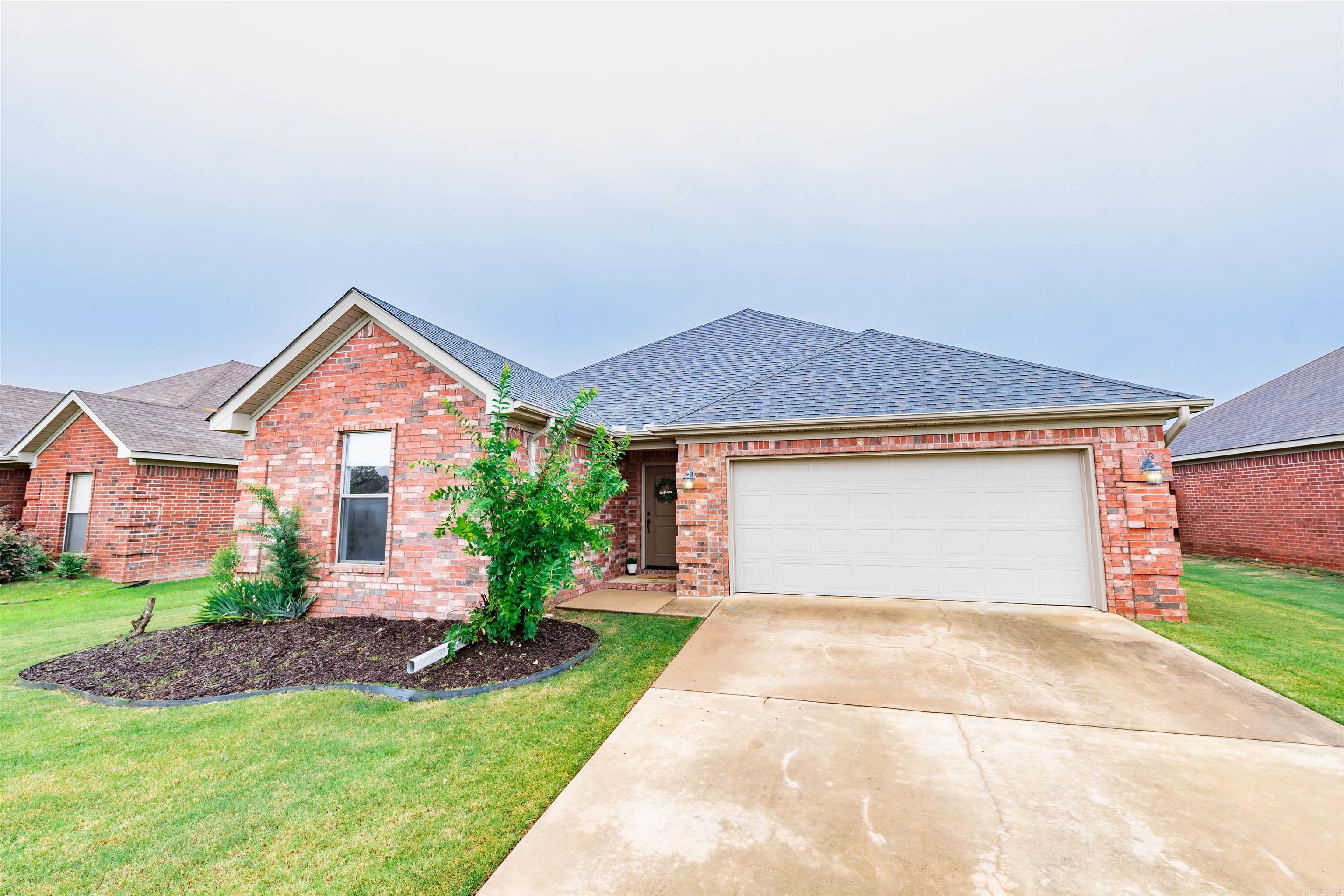 Charming 3 bedroom, 2 bathroom, home in the well established Country Club neighborhood of Maumelle. This delightful home has underwent upgrades in the last couple of years such as interior paint, Luxury Vinyl flooring, and a newly installed roof. Step inside, and you'll be greeted by an interior that exudes warmth and character. The open-concept layout creates a seamless flow between rooms, making it perfect for both entertaining and everyday living. Natural light spills through the windows, creating an inviting atmosphere! This home is an exceptional find, offering both comfort and aesthetics in one delightful package. Don't miss the opportunity to make this house your new home!