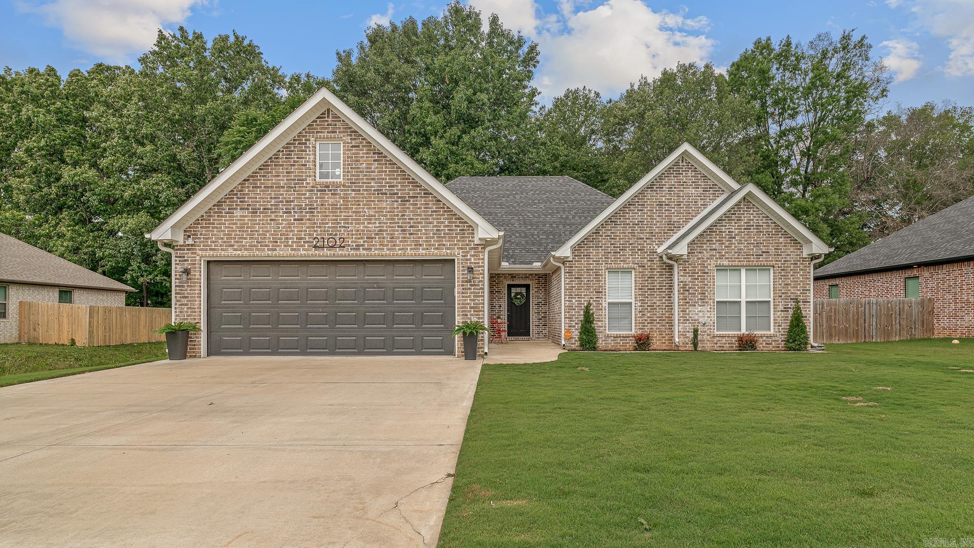 Tucked away on a quiet cul-de-sac, this 2022-built beauty checks ALL the boxes! This 3 bedroom, 2 bath all-brick home brings the perfect mix of style, comfort, and functionality. From the moment you walk in, you’ll love the open-concept layout, spacious dining area, and gorgeous granite countertops that make the kitchen the heart of the home.The split floor plan offers privacy for the primary suite, complete with a tiled walk-in shower and a relaxing soaker tub! Step outside to a covered back porch overlooking the fenced backyard.  Built in 2022, All brick exterior, Open floor plan ,Granite countertops, Spacious dining area, Split bedroom layout, Covered back porch, Fenced backyard and a  Cul-de-sac location this one is Move-in ready and cute as can be!