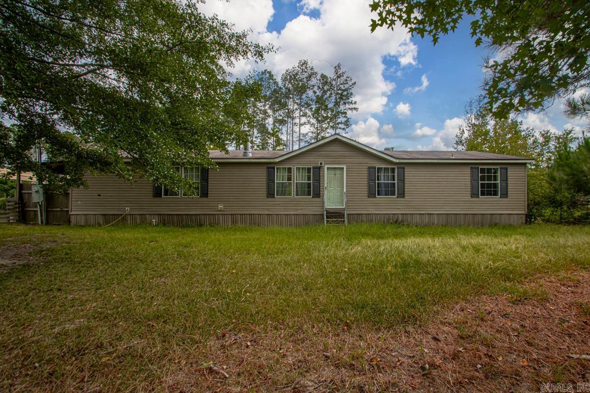 Come check out this spacious manufactured home with 5 bedrooms and 3 bathrooms that sits on 1.32 acres!! Located in Bryant School Districts within saline county. Large living room with corner electric fireplace. Opens into the dining area and kitchen. Plenty of cabinets in the kitchen for storage also plenty of countertop space. All stainless steel appliances. Spacious primary bedroom off the living room with it's own ensuite that consists of sink, soaking tub and walk in shower. 4 additional bedrooms and 2 full baths off the hallway. Located in a quiet cul de sac. Property backs up to woods for added privacy! Come see it today!