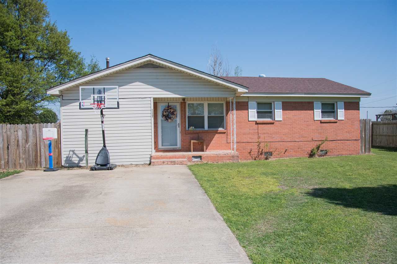 Charming brick and vinyl home with a covered front porch. Family room sits right off the entrance and has plush neutral carpeting. The eat-in kitchen has vinyl tile floors, abundant cabinetry and matching appliances. Right off the kitchen is a second living room that has a brick fireplace. Other amenities of the home include a large privacy fenced backyard, patio, and large workshop. A new HVAC unit was also installed 6 months ago. This would make a great first time home or investment property.