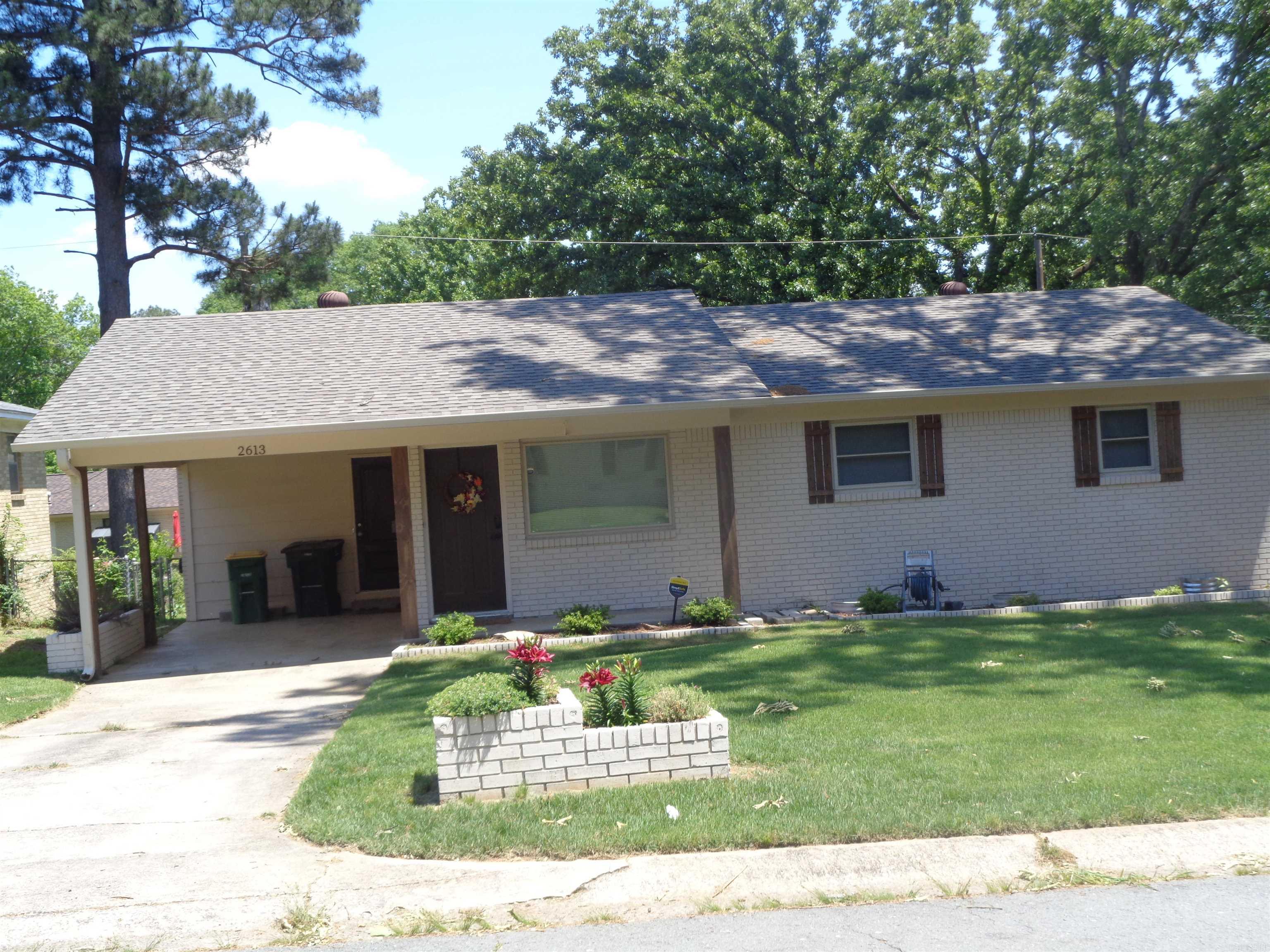If there is a better looking, more updated, well-cared for home in Little Rock let me know because this all brick, 3 bedroom 2 bath house is so sharp. The owners have made this a beauty from the roof to the foundation. It has a new roof, new deck, new flooring, new kitchen cabinets, new granite counter tops, a new breakfast bar island, a new master bathroom, new hall bathroom, new patio door, new plumbing, new hvac units, new landscaping, new gas range, new micro-wave, new dishwasher. The new refrigerator, washer/dryer, televisions and the other personal devices convey in "As Is" conditions. Agents please check remarks.