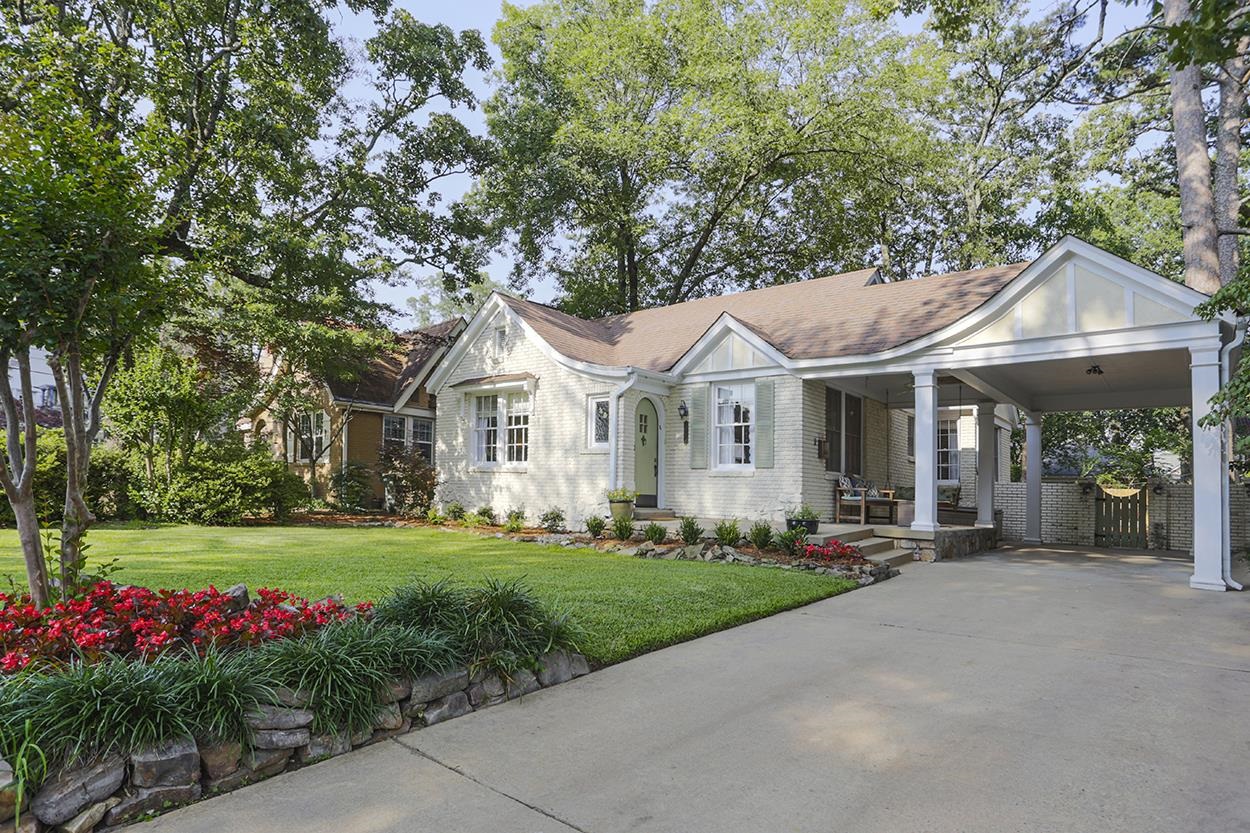 A charming Heights bungalow on a quiet, pretty street.  Arched doorways, beautiful windows, hardwood floors in living areas and terra-cotta tile floors in the kitchen are just a few of this home's special features.  Lovely oversized backyard with koi pond and lush landscaping provide ample outdoor space to entertain and play. Covered patio and carport in the front add to the beautiful curb appeal and provide additional outdoor, covered space to enjoy.  Three nice sized bedrooms and two baths- large walk in closet in primary bedroom.  Brand new paint and ductwork. Walking distance to neighborhood elementary school, boutiques and restaurants. This is such a special home!