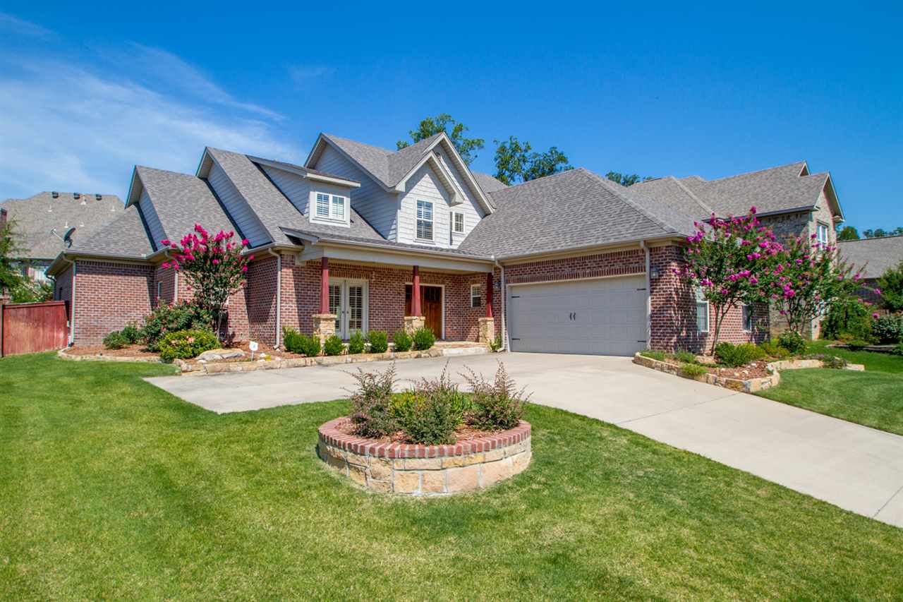 Bill Parkinson built home w/ great floorplan. 2 BR on main level plus Formal dining & gourmet kitchen open to large hearthroom w/ stone fireplace, hand scraped hardwoods & abundant light. Large mudroom & laundry. Upstairs are 2 BR's that share a Jack & Jill bath & playroom. Abundant walk out attic storage. French doors open to patio & extensively landscaped yard w/ sprinkler system. Plantation shutters. throughout. Walk to neighborhood pool, playground & tennis courts. Square footage is from county records.