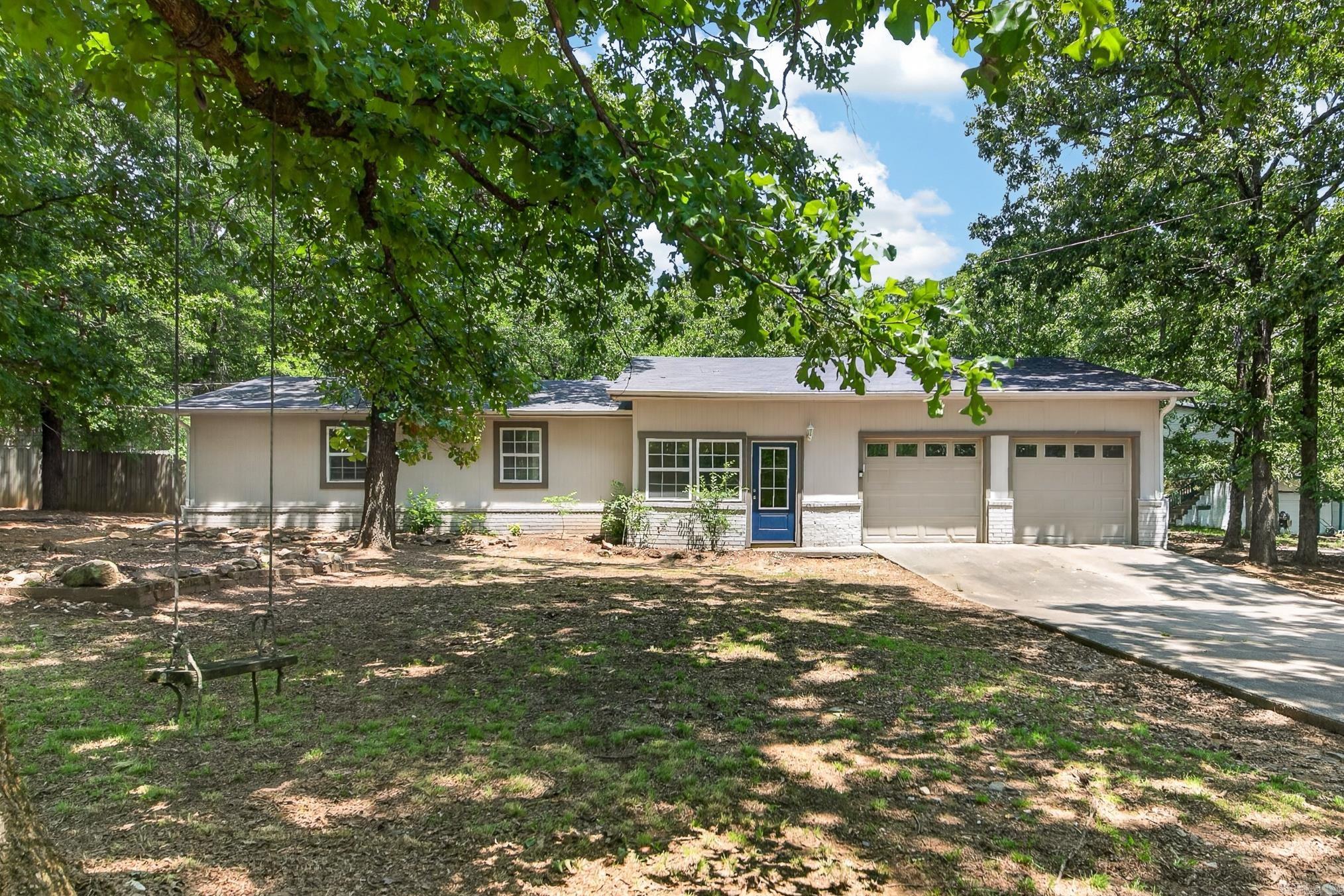 Welcome to 207 Orchid Drive in Sherwood, Arkansas—a delightful home offering a perfect blend of comfort and style. This charming residence features three spacious bedrooms and two well-appointed bathrooms, ideal for families or those seeking a tranquil retreat. The open-concept living area is bathed in natural light, creating a warm and inviting atmosphere for gatherings. The wood kitchen boasts stainless steel appliances and ample counter space, perfect for culinary enthusiasts. Outside, a private backyard oasis awaits, offering a serene setting for relaxation or entertaining. Conveniently located near schools, shopping, and dining, this property is a must-see for anyone seeking the best of suburban living.