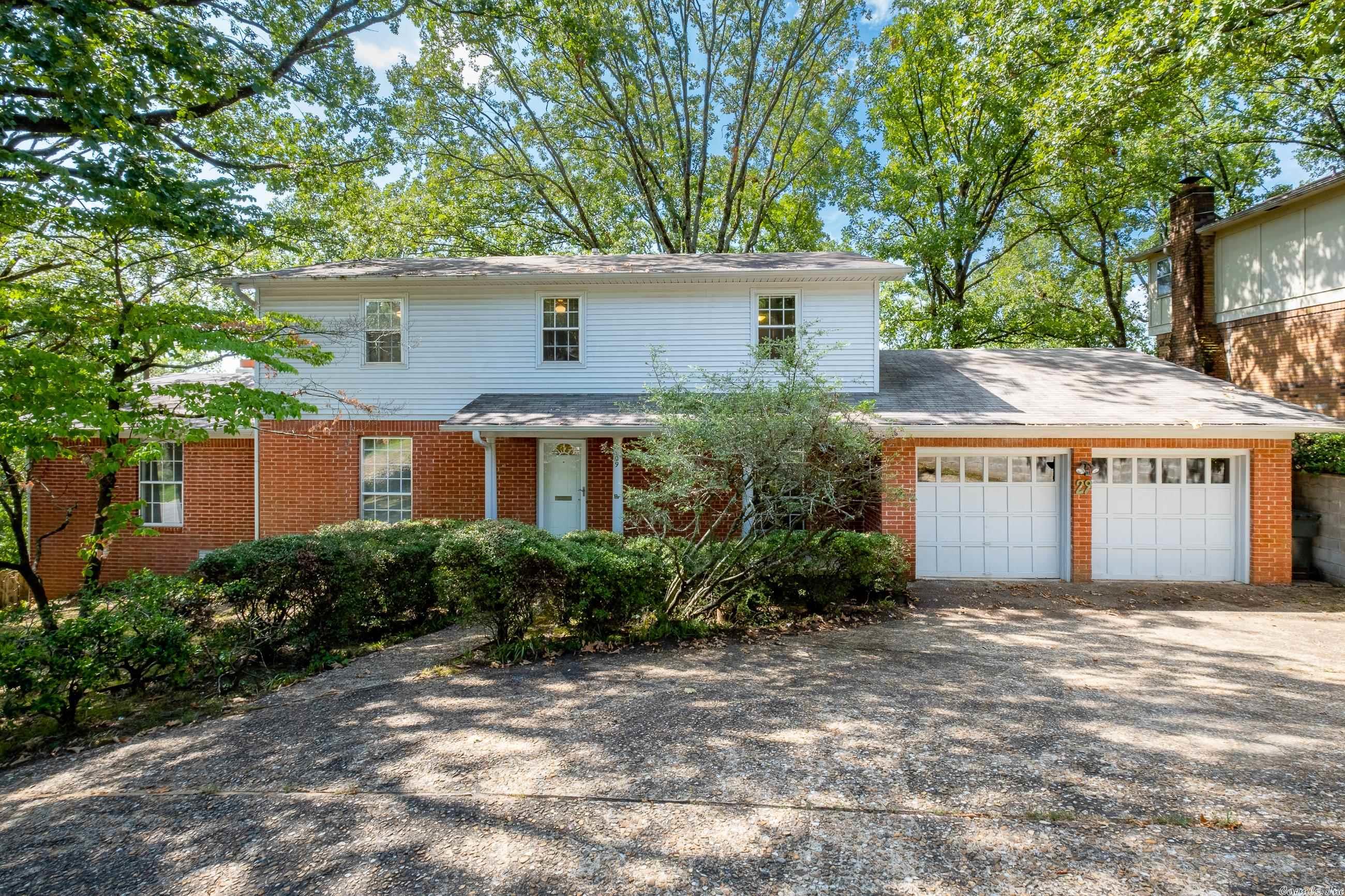 2nd owner -Expensive renovation done = kitchen & 2 baths. Family-size kitchen w/ granite & tile backsplash, double door refrig, 5 burner gas range & dishwasher. Powder room & primary bath beautifully remodeled. Tremendous cabinet storage in kitchen & 2 charming corner cabinets in breakfast area. Glass front cabinets in DR.  Downstairs = Laundry, big pantry, kitchen & breakfast room, LR, DR, Den w/ FP & powder room. 4 BR and 2 baths up. Big closet in primary bedroom. Roof 2014. Sale was "As-Is".