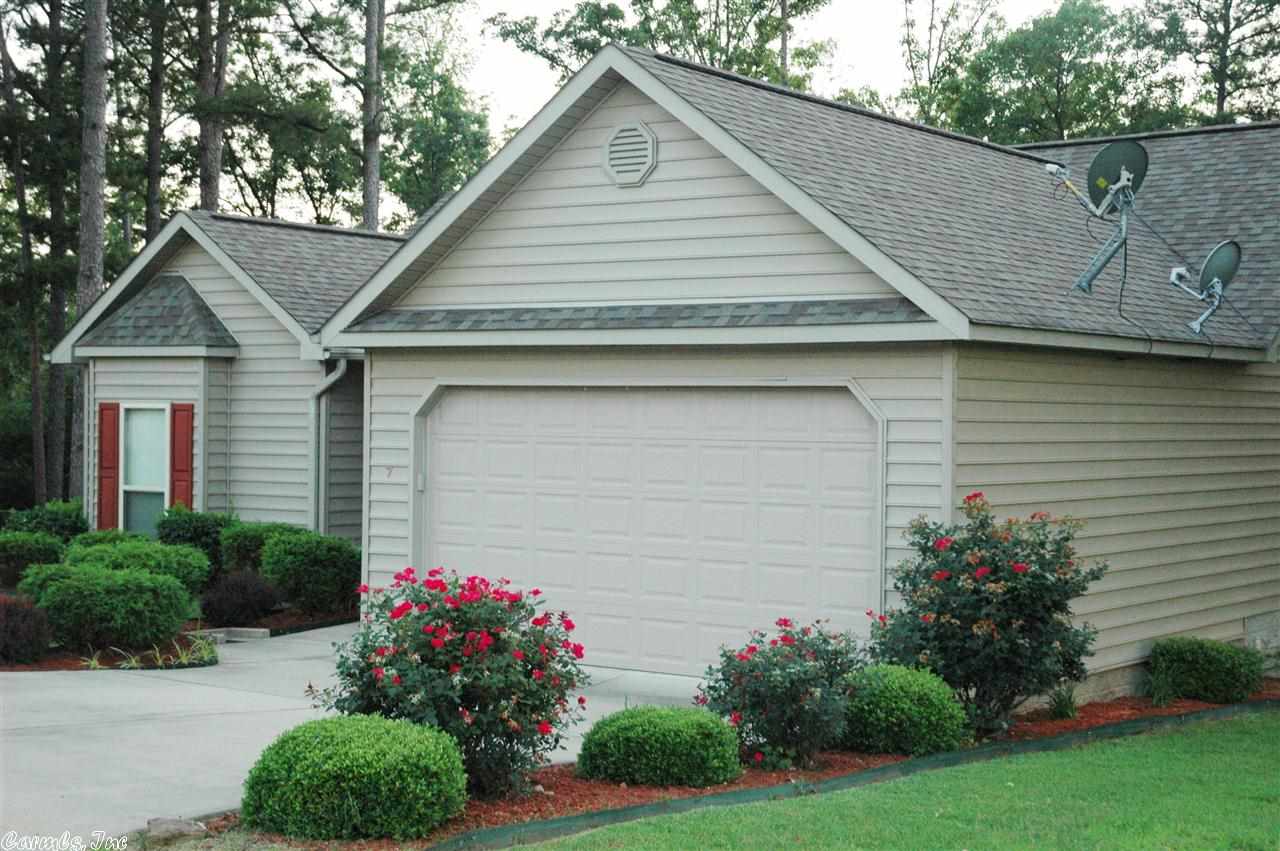 Adorable gated community w/swimming pool,picnic area,tennis court,basketball court,sand volleyball,horseshoe pit & yard maitenance included in Assoc.fee.Wonderful neutral colors,kitchen opens to dining room features breakfast island.Enjoy a covered screened-in deck w/extra storage on & below deck.2-car garage w/floored attic.Option to buy 14x30 storage unit w/shop, exterior side entrance, & oversized garage door for $8,500.Also, option to buy furnished w/dining room living room,3 BR, & sunroom furniture $3k