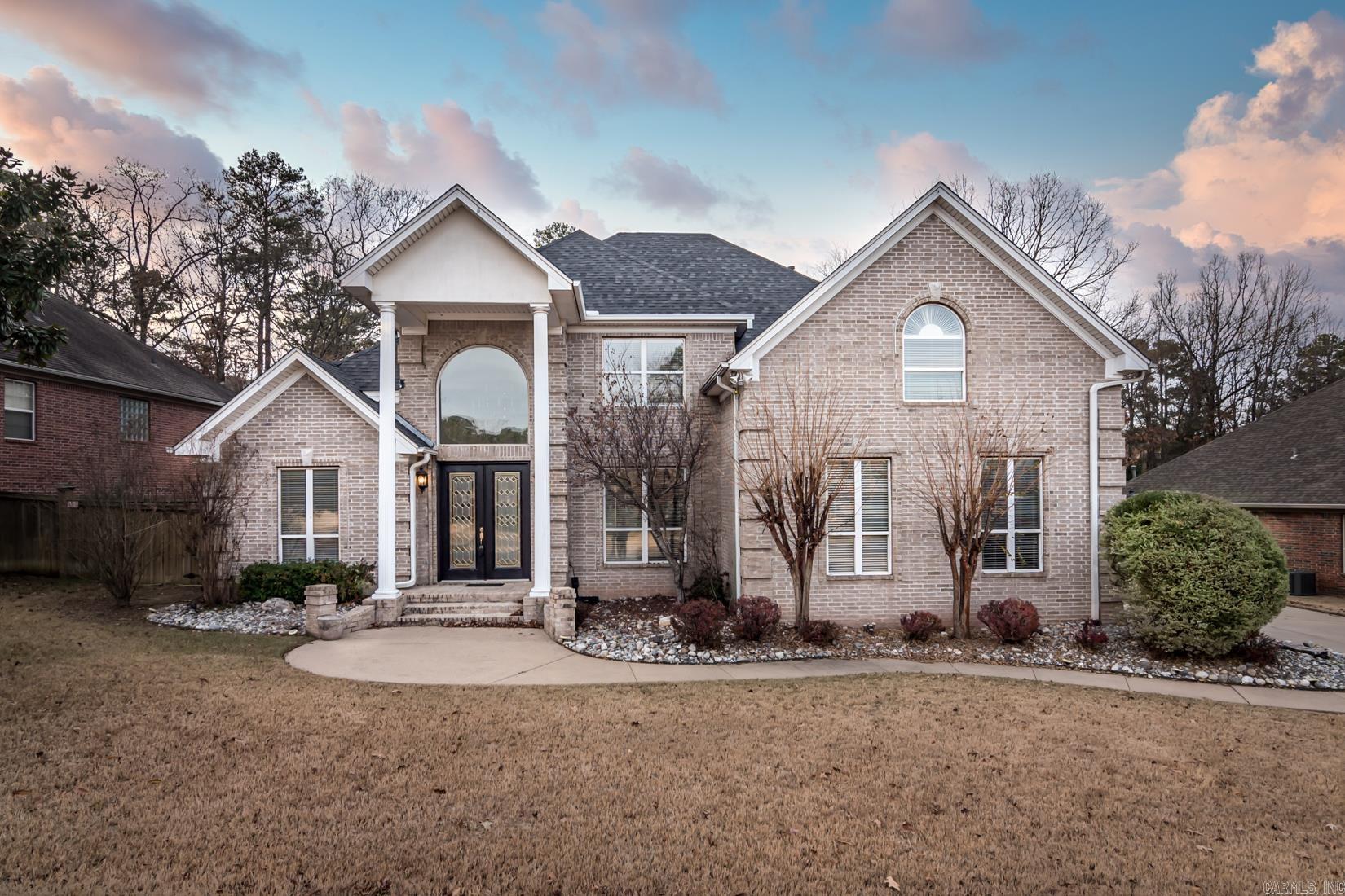 Located in the heart of Chenal Valley, this home is positioned on a flat lot that backs up to dedicated green space with a view of beautiful trees and nature with access to a walking trail accessing the neighborhood’s two ponds! The entry opens to a dining room and two-story great room with beautiful natural light overlooking the backyard. The kitchen features a new stainless GE appliances, granite countertops, breakfast area and a pantry.  The kitchen is open to a hearth room with fireplace. The primary suite is also located on the main level!  Upstairs features two bedrooms, an office and game room with wet bar. Features include a new roof (2023), new carpet throughout, new luxury vinyl plank in all of the main living spaces!  Wonderful backyard and a three car garage!