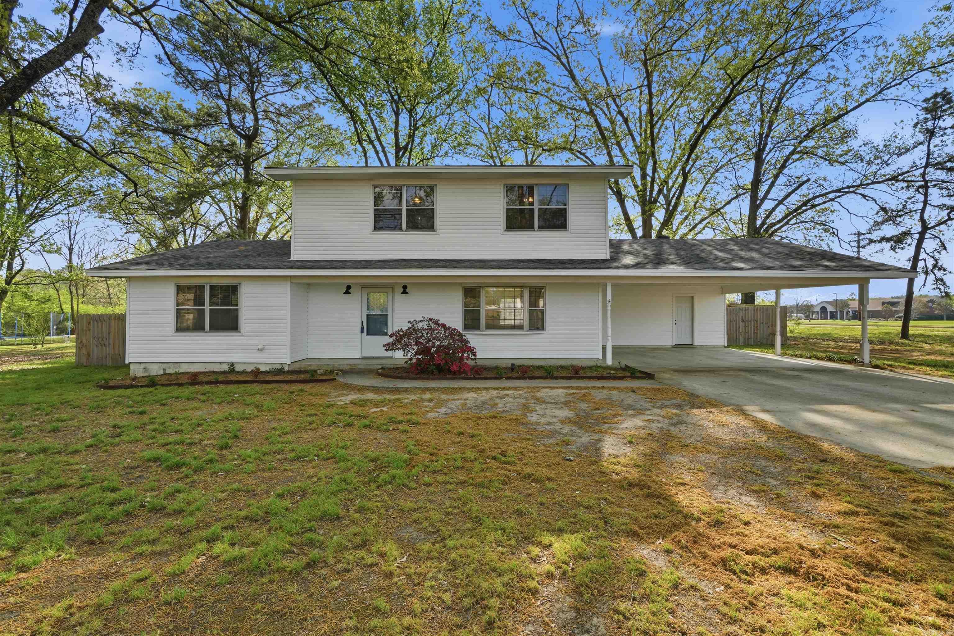 Great residential and possibly commercial opportunity just off of Dave Ward Dr. Well-equipped, and in a well-established neighborhood just minutes from everything Conway has to offer. Sitting in an unbeatable location just a stone's throw from UCA campus, this inviting property features a functional two-story layout with comfortable living space, natural light throughout, and a fenced backyard perfect for relaxation or entertainment. Whether you're looking for a primary residence or a solid investment property in Conway's strong rental market, this home offers excellent value. Remodeled in 2023, you'll be able to sleep comfortably knowing your investment will be in excellent condition for many years to come. LVP floors, modern lighting, quartz countertops, Stainless steel appliances, new fence, updated HVAC, updated water heater, remodeled bathrooms, a well-appointed laundry room with a connecting mud room, and more! Currently Zoned R-2. If you're interested in turning this into a business office, it MIGHT be possible by rezoning to O-3. These addresses just a block over were previously R-2 and were successfully rezoned to O-3: 2002 Daveward Dr, and 708 S Baridon St.
