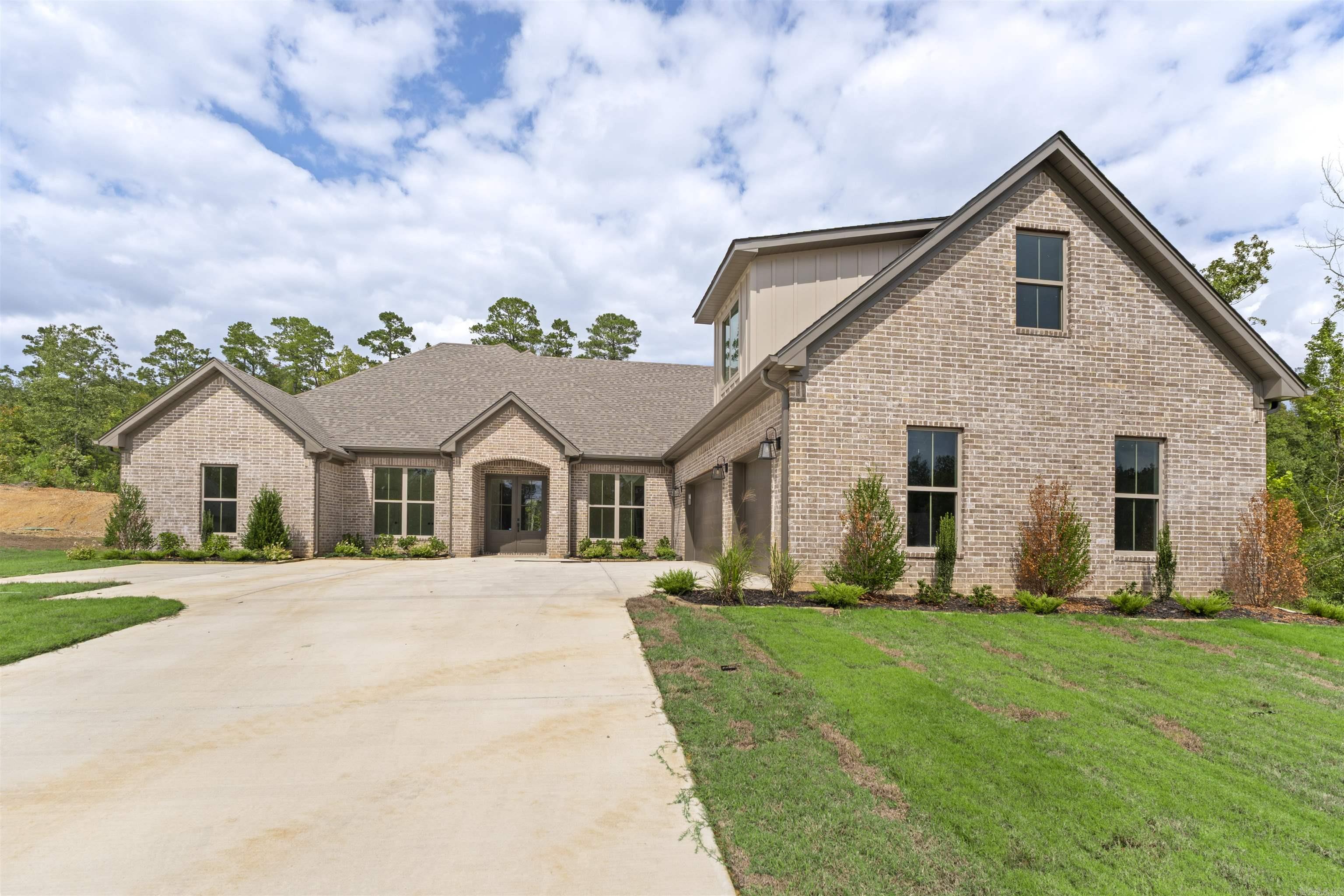 Spectacular price on this stunning home. Too many upgrades and features to list. This one is a must see. Located in the highly desirable gated Charleston Place development that is conveniently located in the Avilla community. This open plan includes gorgeous wood beams, centered fireplace and an unbelievable kitchen with quartz tops and chef's appliances. The spacious primary suite includes an incredible bath and closet space that leads directly into the laundry area. Generous sized guest suites, large bonus room and so much more. Agents see remarks.