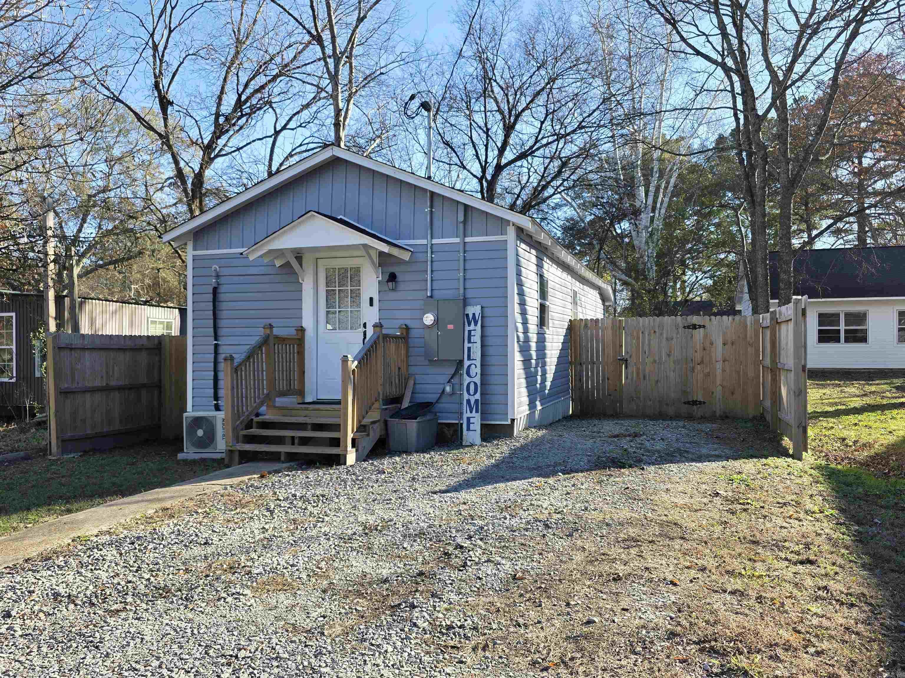 Back on market at no Fault of the seller... Don't miss out on this Cutie. This Tiny but beautiful home had a complete remodel by a replicable contractor in  May of 2024. So everything is still like new.  Enter this cutie off a small front covered deck into an open Kitchen/LR with all the appliances (only a year and half old) - good Cabinet Space so it has all you need for cooking/entertaining. Then a small hall leads to a nice size Bedroom then Great Bath with Laundry off of it. Finish at the back door with a great Mud space area out to a covered back porch and Huge Fenced in Yard. Great location in a nice neighborhood. House is heated/cooled by Mini Split that is only 1 1/2 year old.  Sq ft est, pls measure.