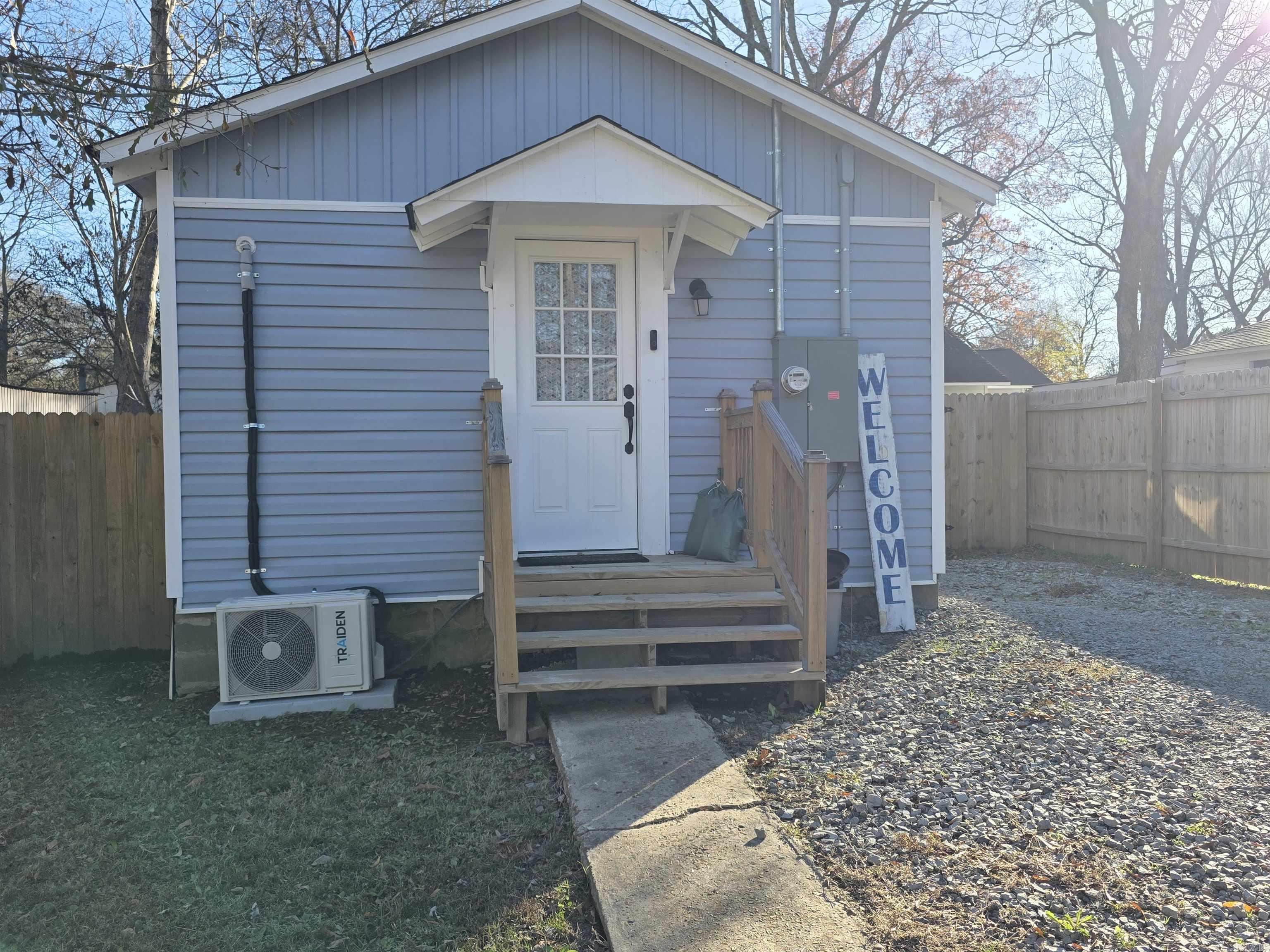 Back on market at no Fault of the seller... Don't miss out on this Cutie. This Tiny but beautiful home had a complete remodel by a replicable contractor in  May of 2024. So everything is still like new.  Enter this cutie off a small front covered deck into an open Kitchen/LR with all the appliances (only a year and half old) - good Cabinet Space so it has all you need for cooking/entertaining. Then a small hall leads to a nice size Bedroom then Great Bath with Laundry off of it. Finish at the back door with a great Mud space area out to a covered back porch and Huge Fenced in Yard. Great location in a nice neighborhood. House is heated/cooled by Mini Split that is only 1 1/2 year old.  Sq ft est, pls measure.