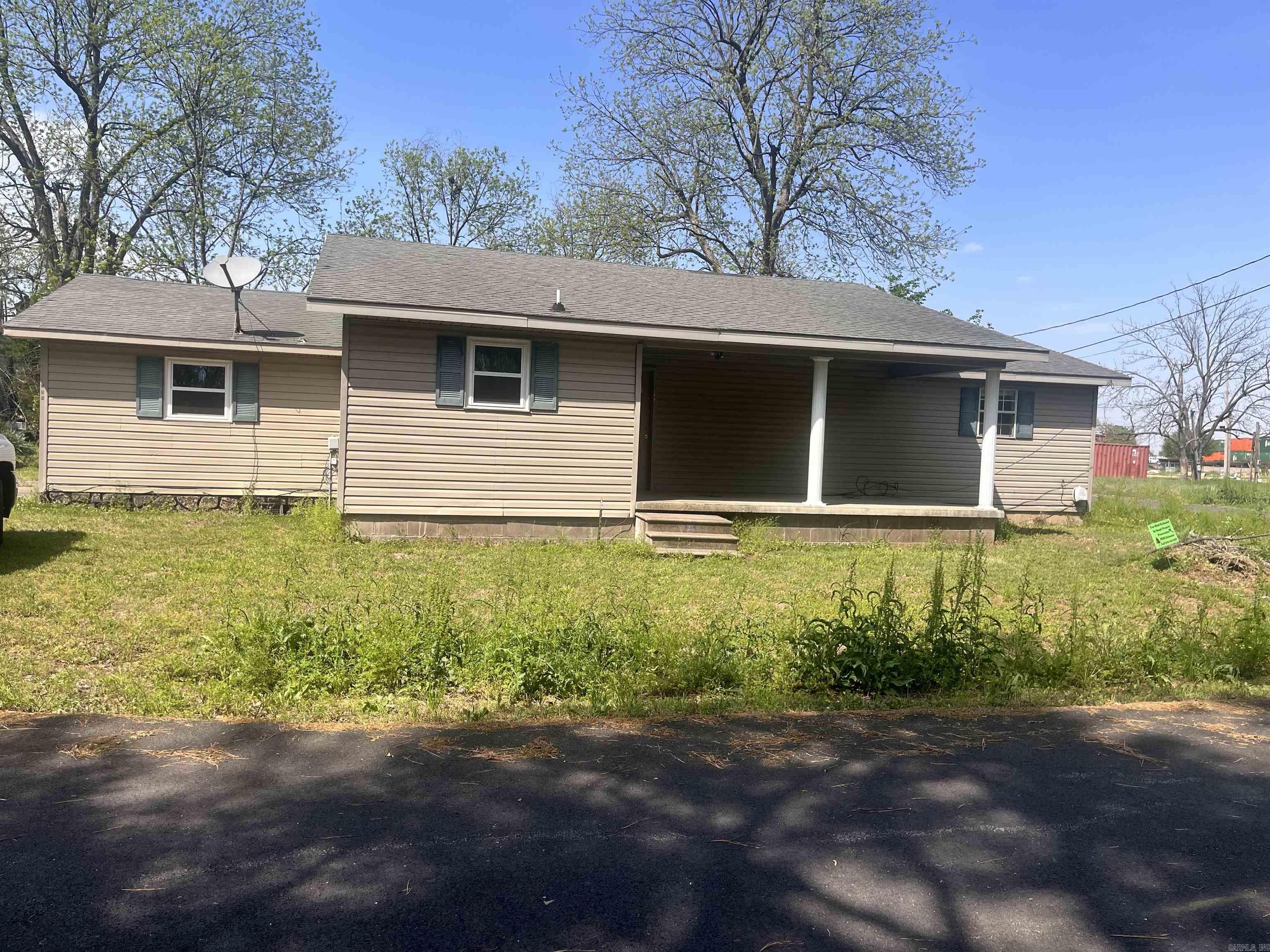 Investment property for a rental or potential future home sitting on a corner lot in the small town of Marmaduke.  Selling as is No repairs.