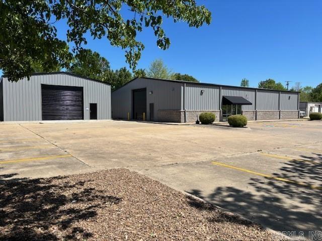 Discover an exceptional opportunity for industrial and manufacturing investment with this impressive property. Boasting a well-maintained total 7,040 SF buildings constructed in 2004 and 2020, this prime site is ideally suited for a range of industrial uses. The property offers a combined total of approximately 7,040 square feet across two buildings. The heated exterior warehouse consists of approximately 2,240 square feet and may be leased separately from the main warehouse/office building, which contains approximately 4,800 square feet and is fully heated and cooled. Zoned C-3. PROPERTY HIGHLIGHTS -Drop down electrical with pre-plumbed air supply plumbing.  -Full climate control in main warehouse.  -Warehouse 2 Heated with full foam insulation.  -Zoned C-3 for flexibility -Ideal for industrial/manufacturing use -Showroom/Waiting/Office area with Bathroom -Shop Bathroom separate.  -New painted exterior and awning.