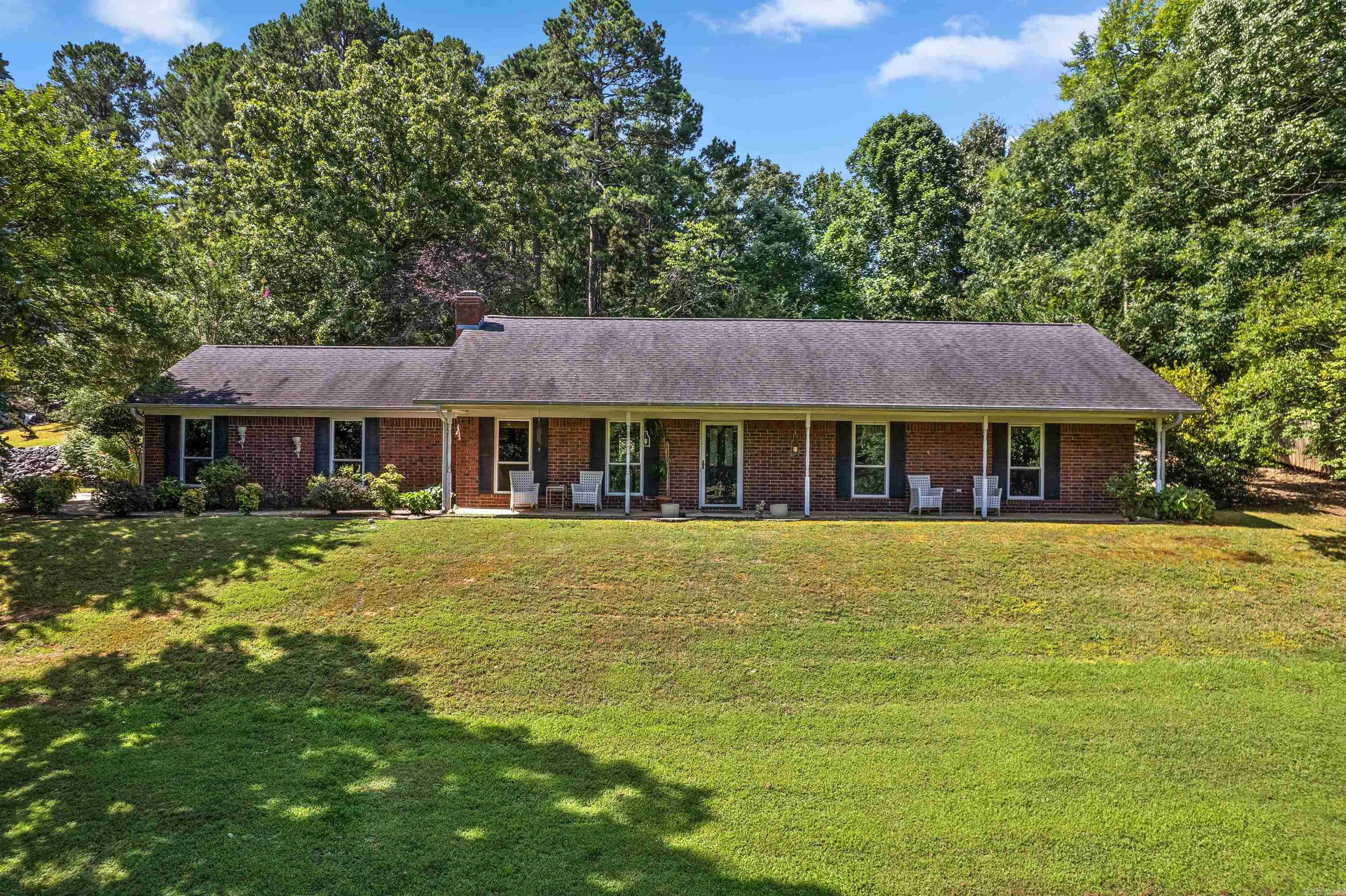 Welcome home to this beautifully updated 3-bedroom, 2-bath home offering 1,550 square feet of comfortable living space on approximately 1.73 acres. The recently updated kitchen and both bathrooms provide a fresh, modern feel, making this home move-in ready. Outside, you'll find three outbuildings equipped with electricity and water, offering endless possibilities for workshops, storage, hobbies, or additional workspace. Gardening enthusiasts will love the greenhouse, complete with electricity and water for year-round growing. The property also features a series of French drains designed to assist with drainage and water management. With its thoughtful updates, functional outdoor amenities, and plenty of room to spread out, this property offers the perfect blend of country living and convenience. Schedule your private showing today!
