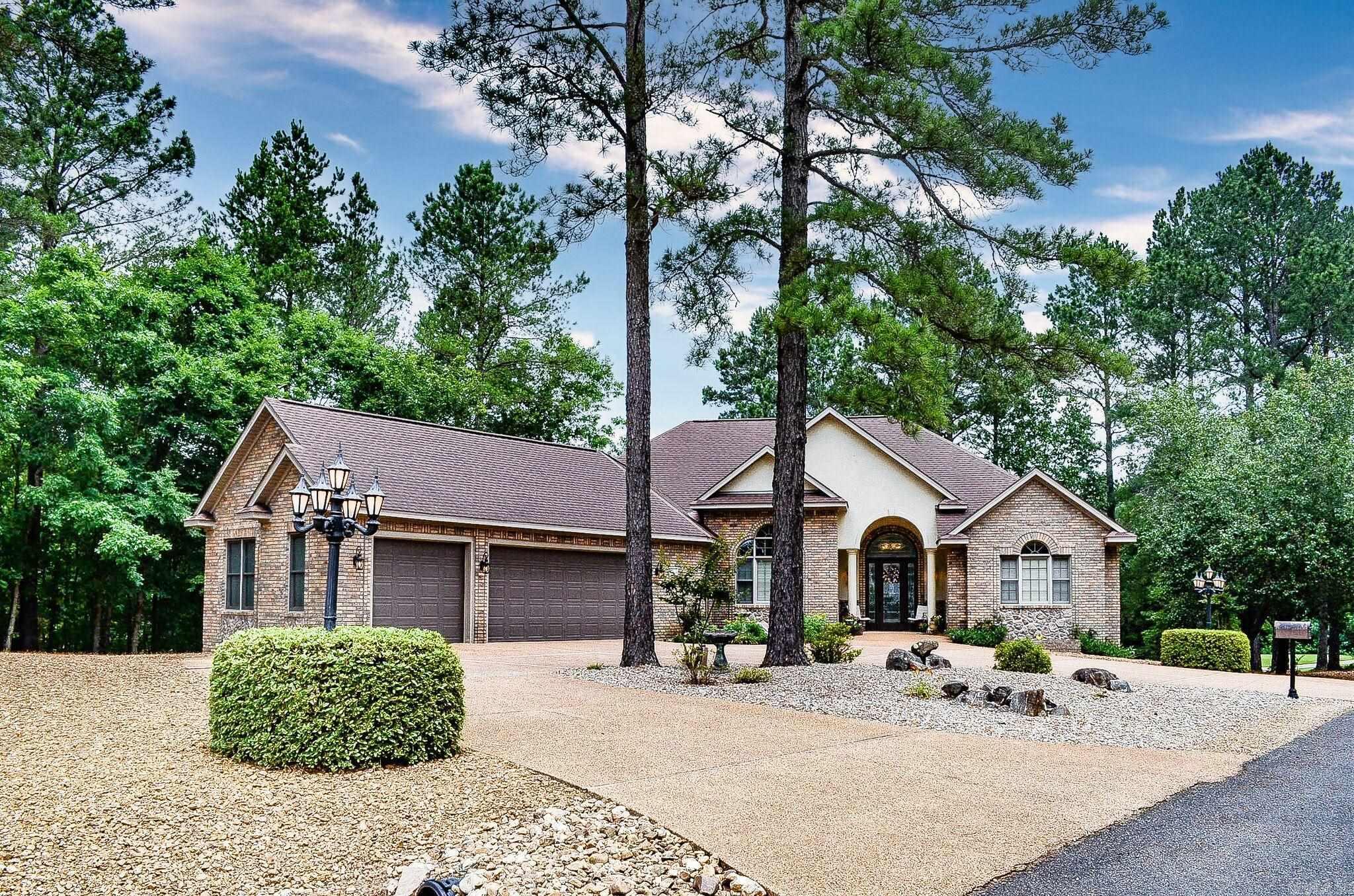 Dreams do come true.....Executive custom built home overlooking #7of prestigious Granada golf course with winter view of Lake Granada. This meticulously maintained 3/4 bedroom plus large office, 3 bath home boasts of 3575 square foot of luxury living. Well appointed kitchen includes Jenn-aire cooktop, double ovens and large step in pantry. Bright breakfast area, handy desk and eat at bar enjoy the golf course views.Spacious primary suite invites you to spa-like bath area. Main level hosts 3 bedrooms, laundry, coffee bar, 2 baths and great room. Lower level houses large storage closet, 3rd bath and flex room currently used as work out area and guest sleeping. Huge workshop and storage in crawlspace area handles any storage needs. Located on nearly a half acre corner lot in a beautiful, friendly neighborhood. Hot Springs Village Property owner Association has a new member buy-in fee of $2,000.00 due and collected at closing. Easy living open floor plan offers breakfast area, counter top setting and dining area.beautiful wood floors
