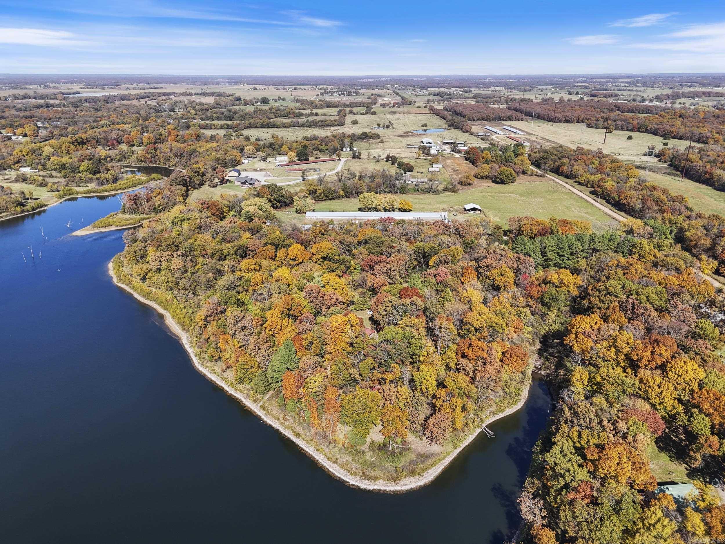 Lakefront Property with 10 Acres – Perfect for a Gentleman’s Farm or Multi-Home Build! This beautiful lakefront property on Lake Flint Creek offers stunning views, direct lake access, and endless potential. Whether you’re looking for peaceful country living, a place to fish, or room to grow, this spot has it all. The home features an abundance of windows that let you enjoy the lake views from inside. Step outside and relax in a quiet outdoor space surrounded by mature trees. There’s also a 352 sq.ft. workshop—great for hobbies, storage, or projects. Property also has a UV System for clean well water! You'll love the extra 5.08-acre lot included with the home, giving you a full 10 acres total. You could build multiple homes, airbnbs, start a farm with the barns, a chicken coop, and gardens, or just enjoy the space for recreation. Lake Flint Creek is well known for excellent bass fishing—anglers come here for the chance to catch large, trophy-sized fish. Whether you're fishing, building your dream setup, or just enjoying the view, this property gives you the space and setting to make it happen. Plus, you're only minutes from schools, shopping, and dining! Schedule a showing today!