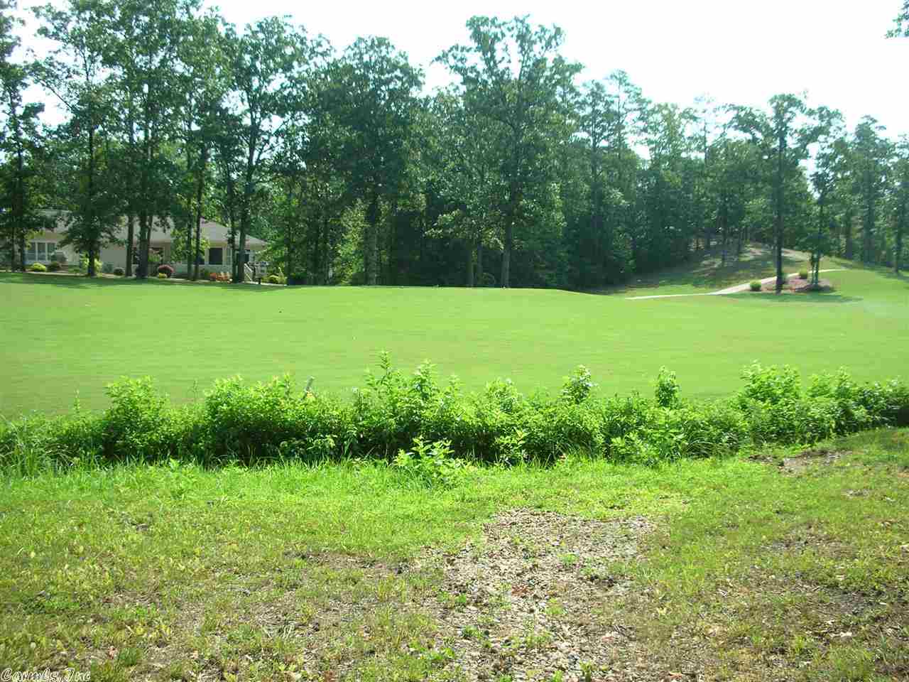 Very level lot on Isabella Golf Course.  This lot has 176 feet on the 5th hole of Isabella - Nina Course.  The rear exposure faces North East. Pictures 7-10 are of the Hot Springs Village area.