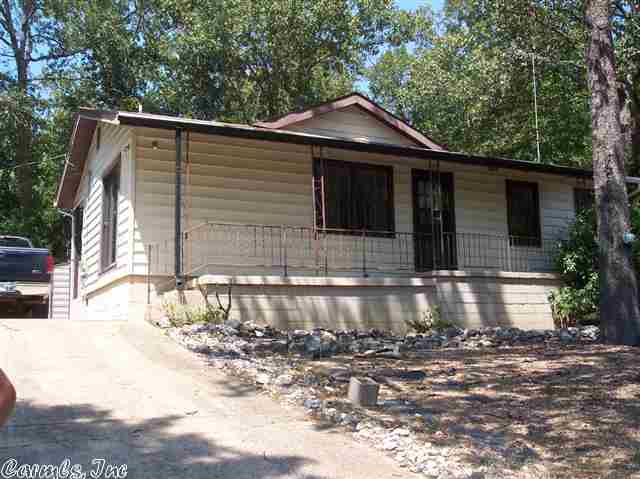 Available July 1st.  2 bedroom home with 1 and 3/4 bath. Vinyl flooring throughout.  Large living room. Corner lot on 2 quiet streets. Close to South Fork of the Spring River and North Golf Course. Not far from town center. Includes shed and partially fenced in area with dog house! Updated roof and central heat and air. Propane heat, water heater & cook stove.   $39 is added to rent monthly for Liability Insurance, Pest control and credit reporting services. Utilities, trash pick-up & lawn care will be the tenant's responsibility. Pets are welcome with a pet deposit per pet.